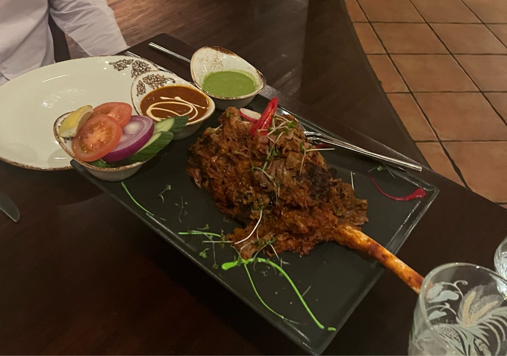 Plate of tandoori lamb leg