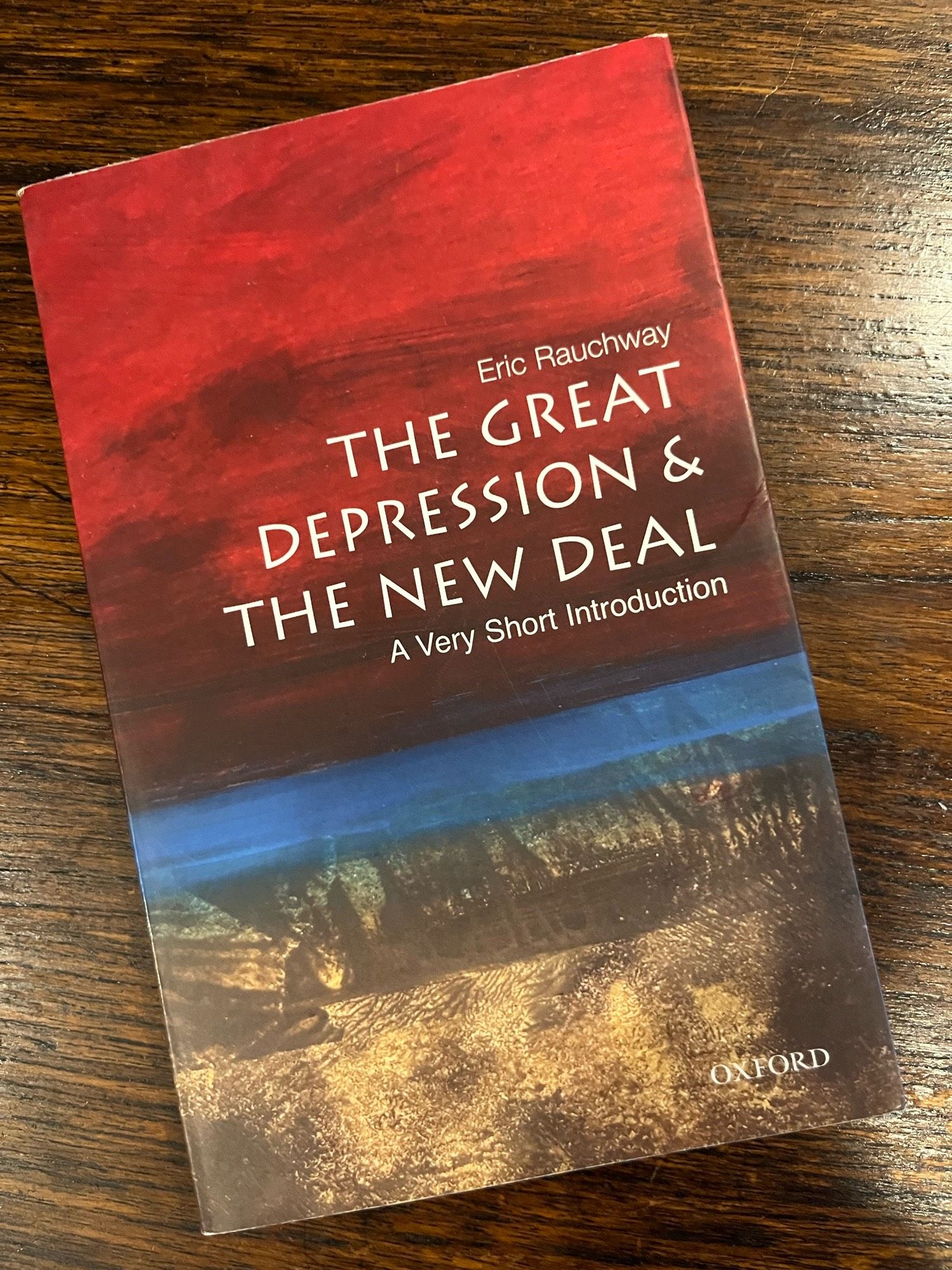 a copy of the book “The Great Depression & the New Deal: A Very Short Introduction” by Eric Rauchway(part of the same series as the book “Terrorism: A Very Short Introduction”)