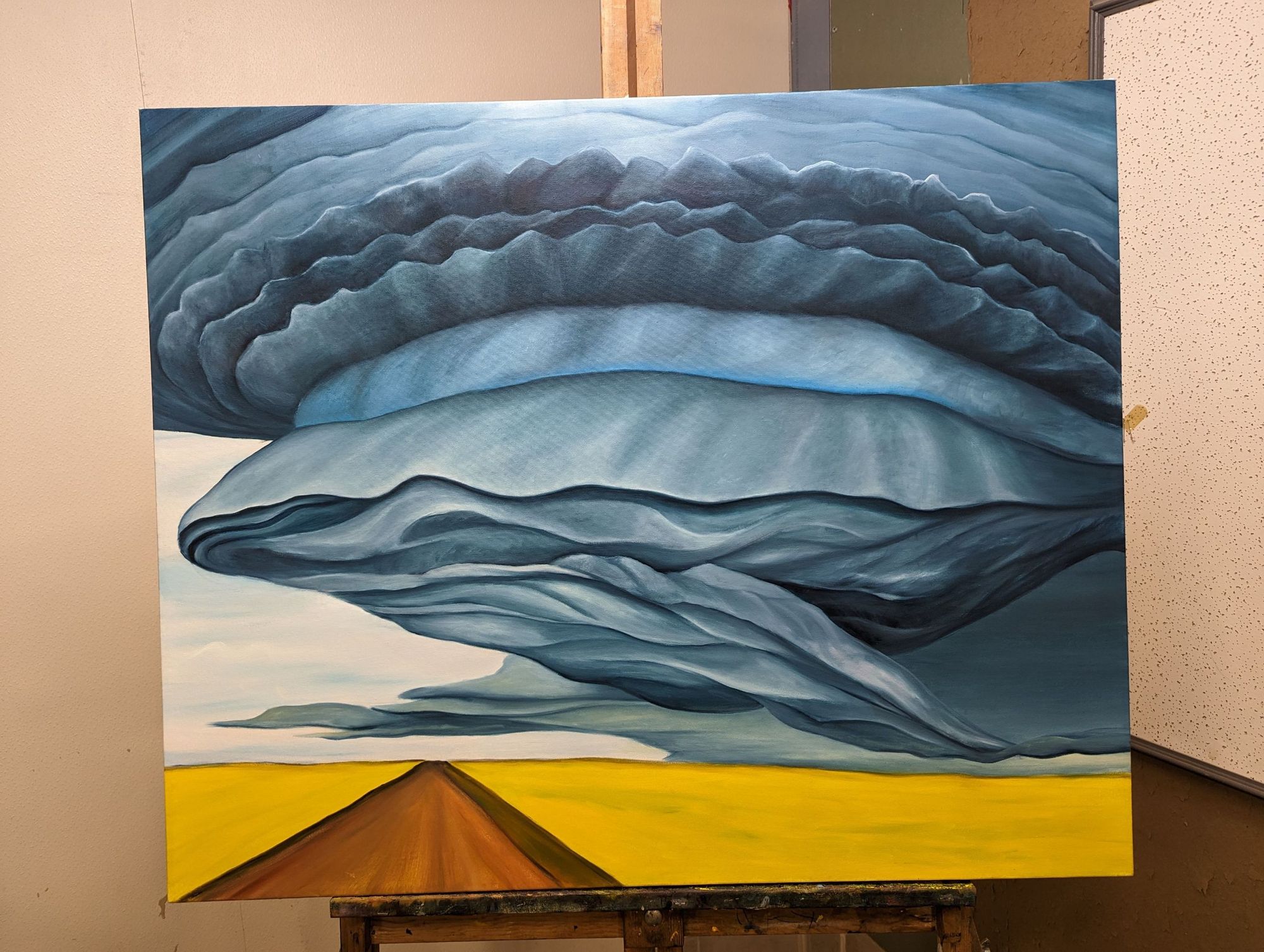 WIP painting of a mother ship super cell over a canola field 