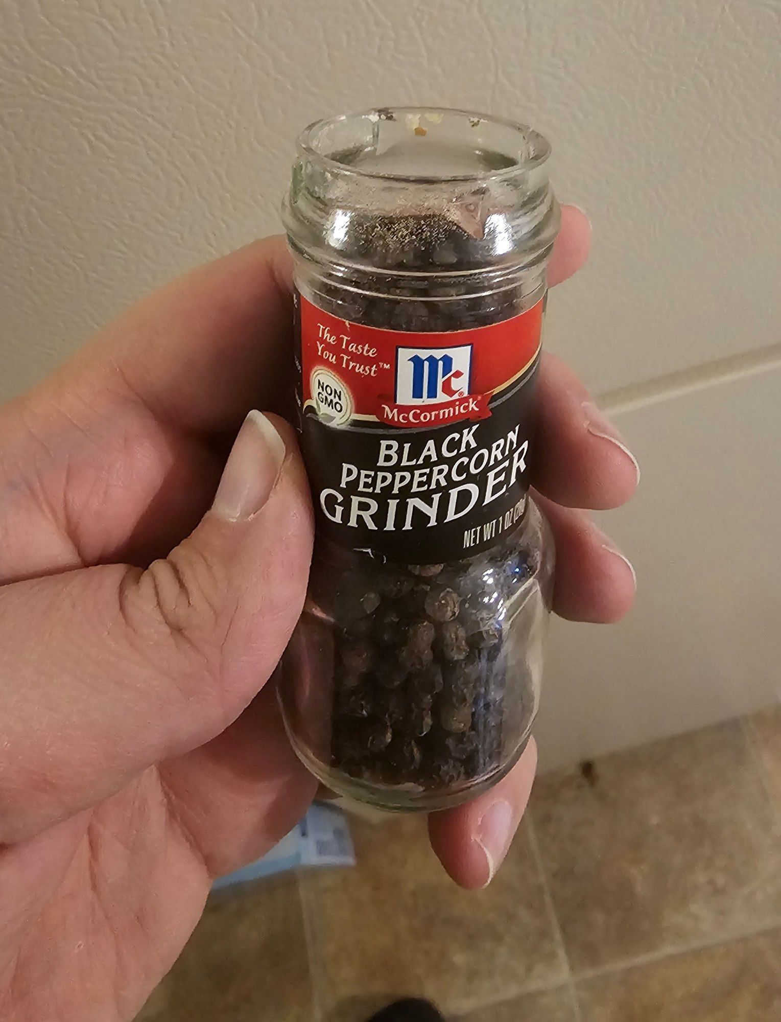 McCormick black pepper corn grinder with lid off