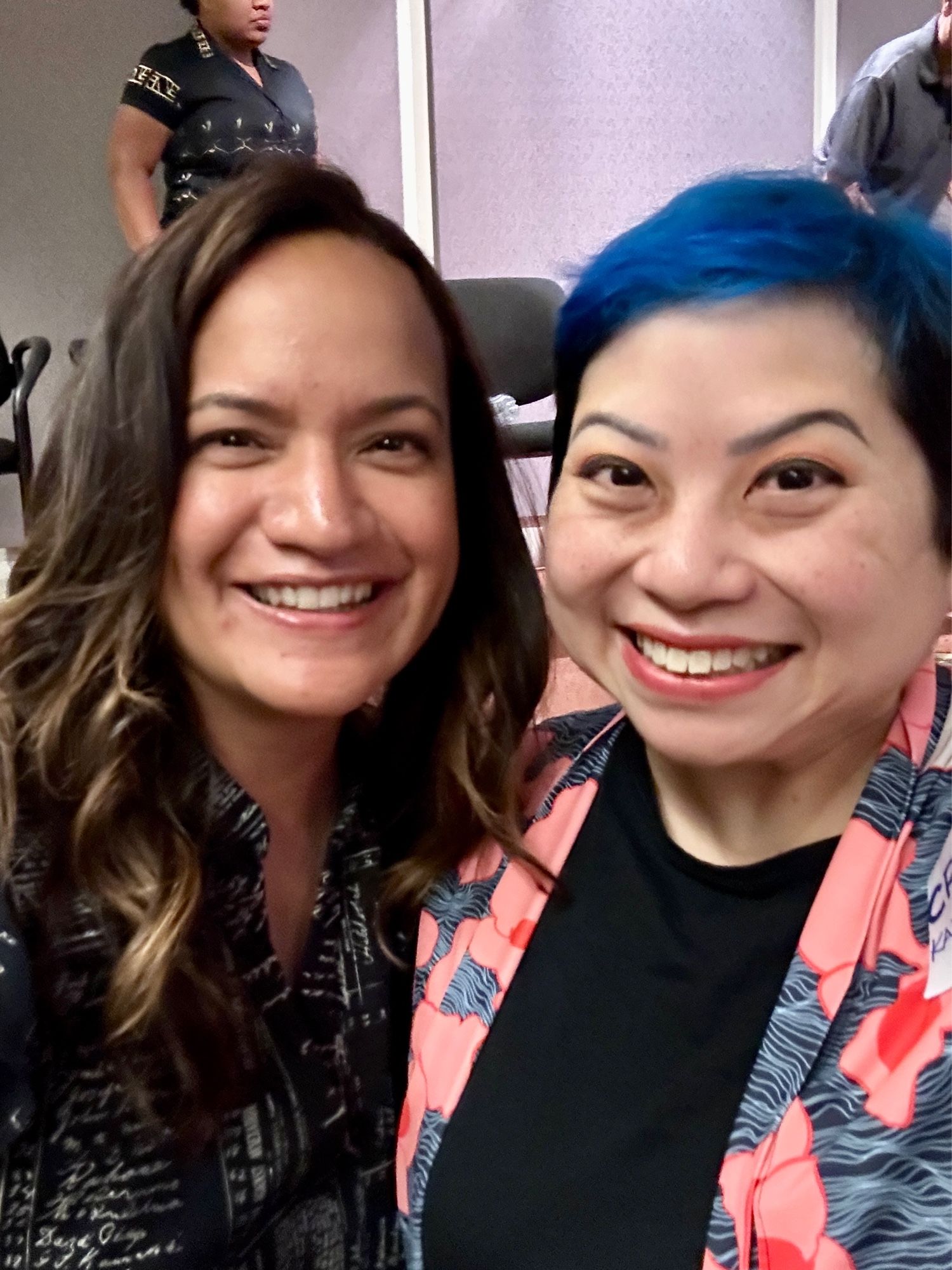 Two women posing for a selfie. 