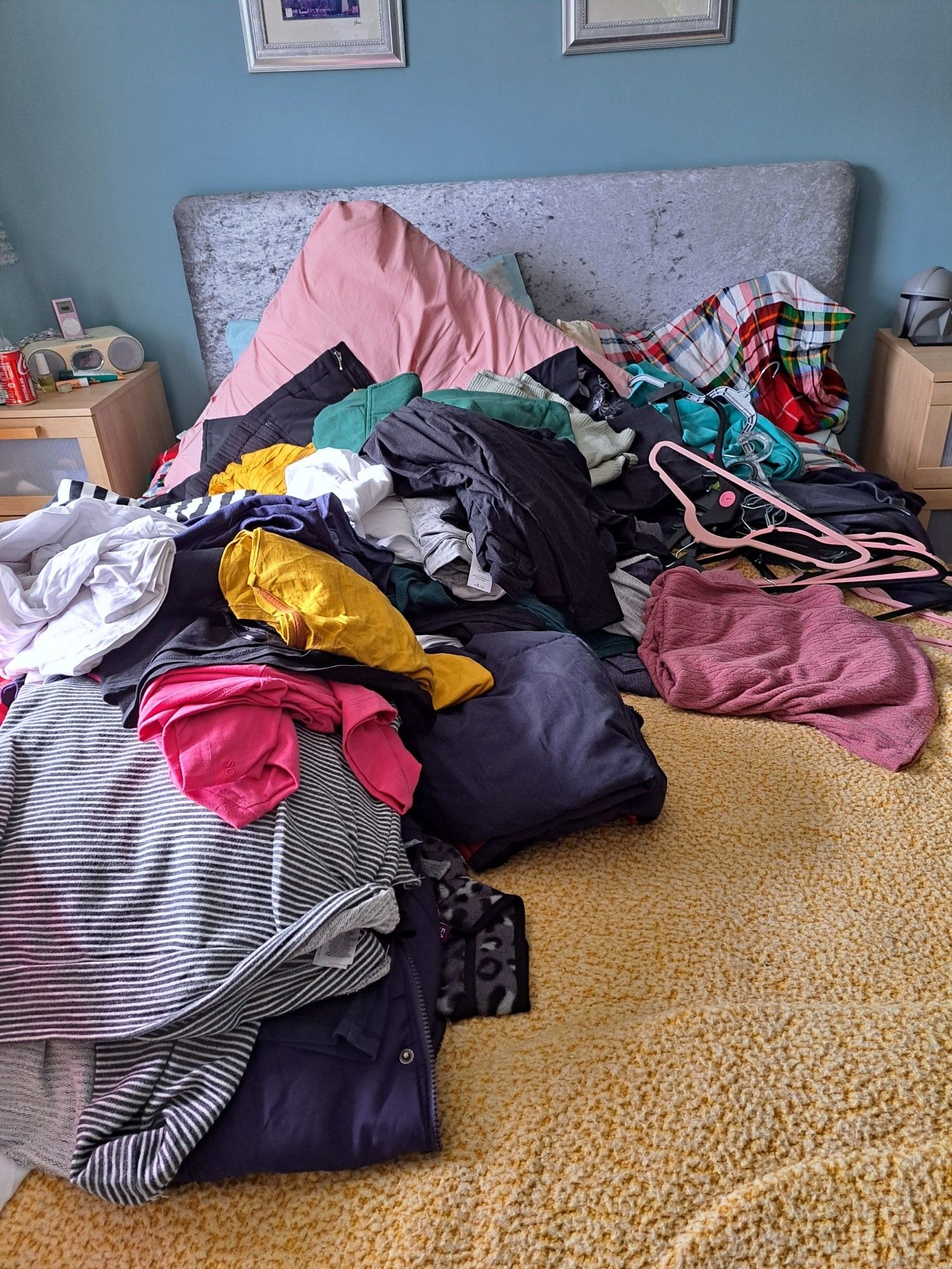 Pile of clothes on bed