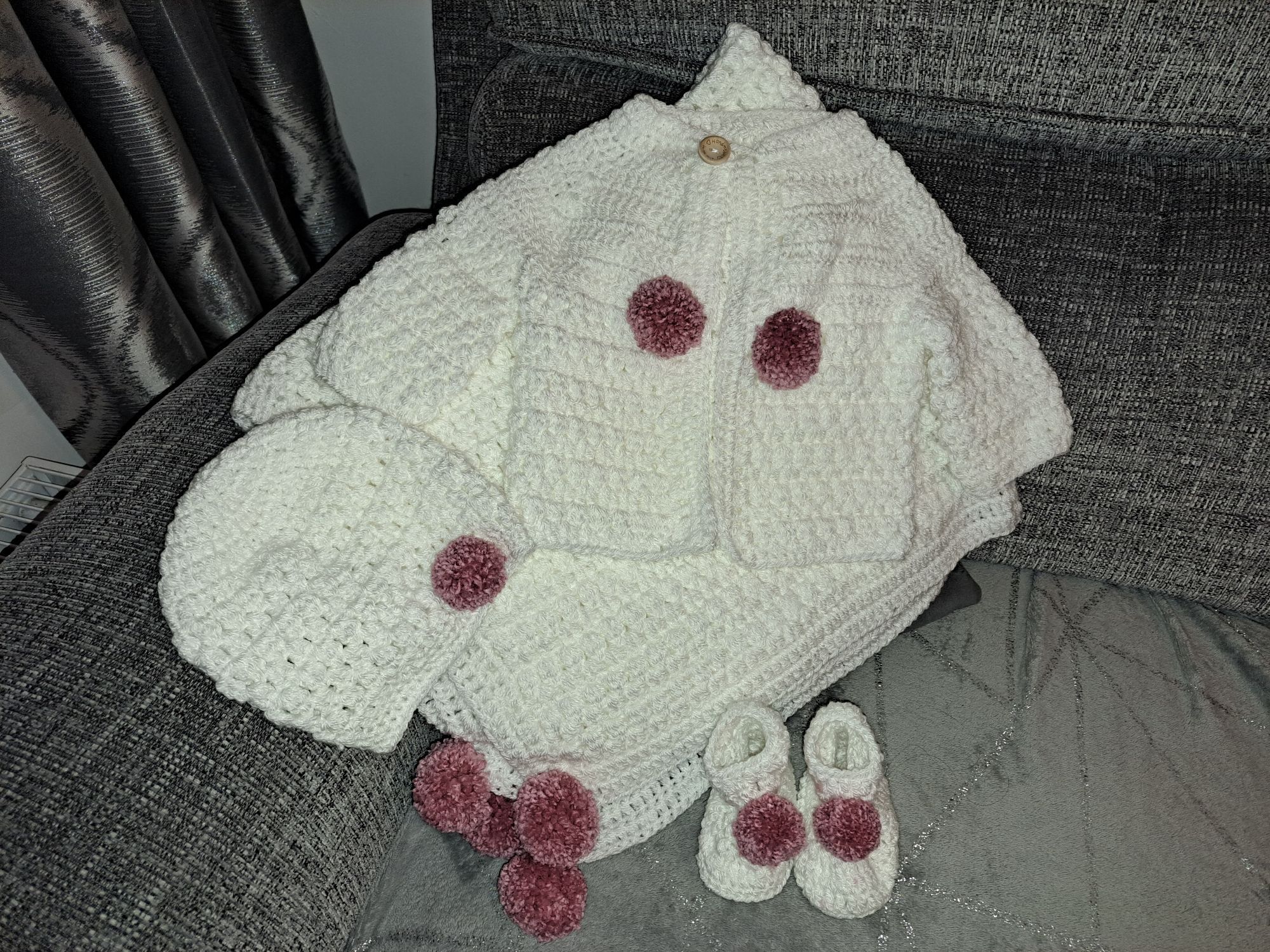 Crocheted blanket, hat, cardigan & booties.