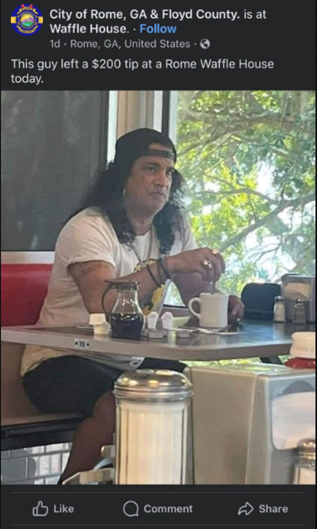 photo of Slash sitting at a diner table, caption reads 

City of Rome GA Waffle House

this guy left a $200 tip at a Rome Waffle House