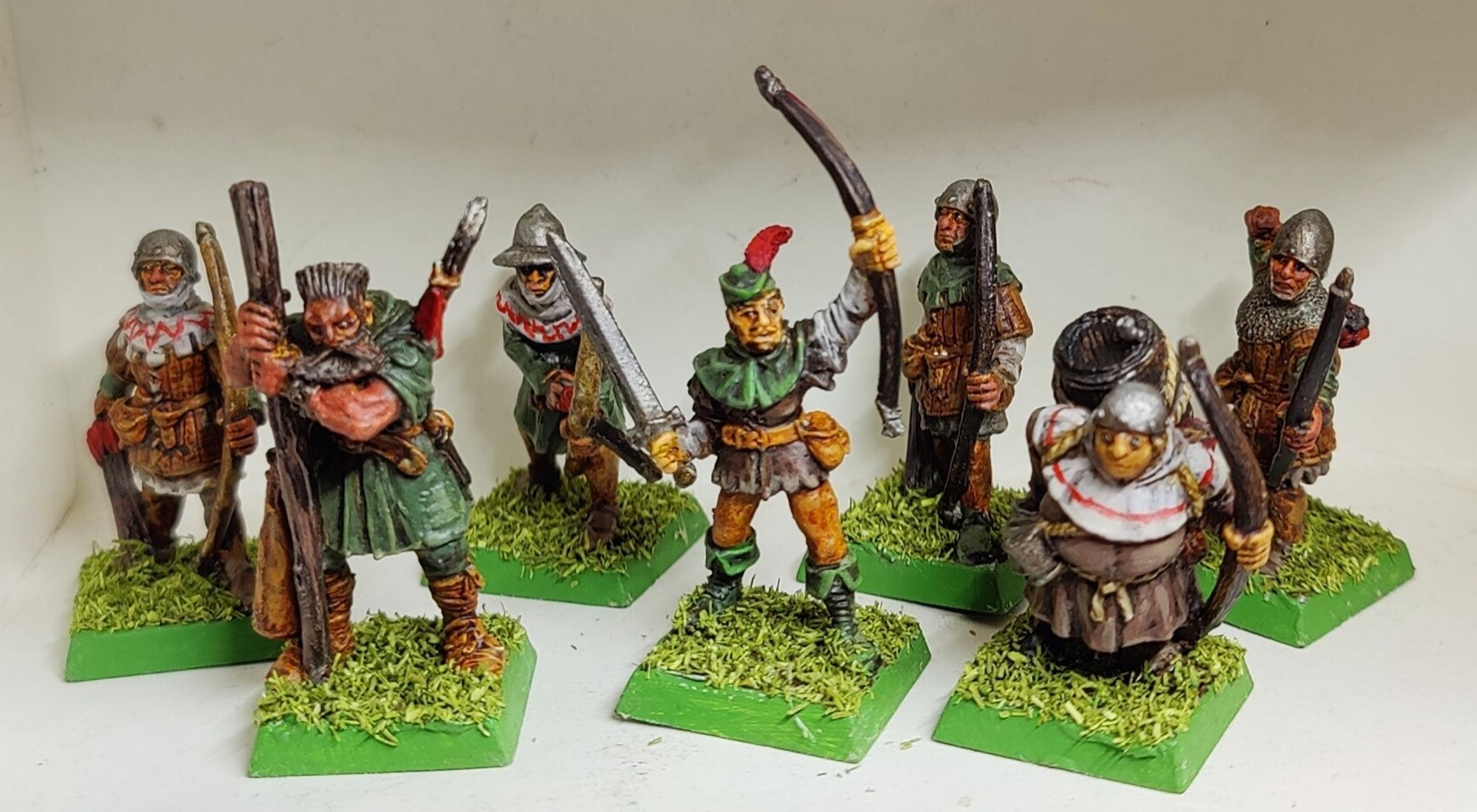 Bertrand le Brigand and the Bowmen of Bergerac, painted by Airylan. Included are Bertrand, Hugo le Petit, and Guy le Gros, along with four of the 5th edition Warhammer era metal Bretonnian bowmen. They are pointed in browns, greens, and cream, with a red accent colour.

Bertrand himself is painted using Carey Elwes' outfit from Robin Hood: Men in Tights as a template, as clearly he can speak in an English accent.