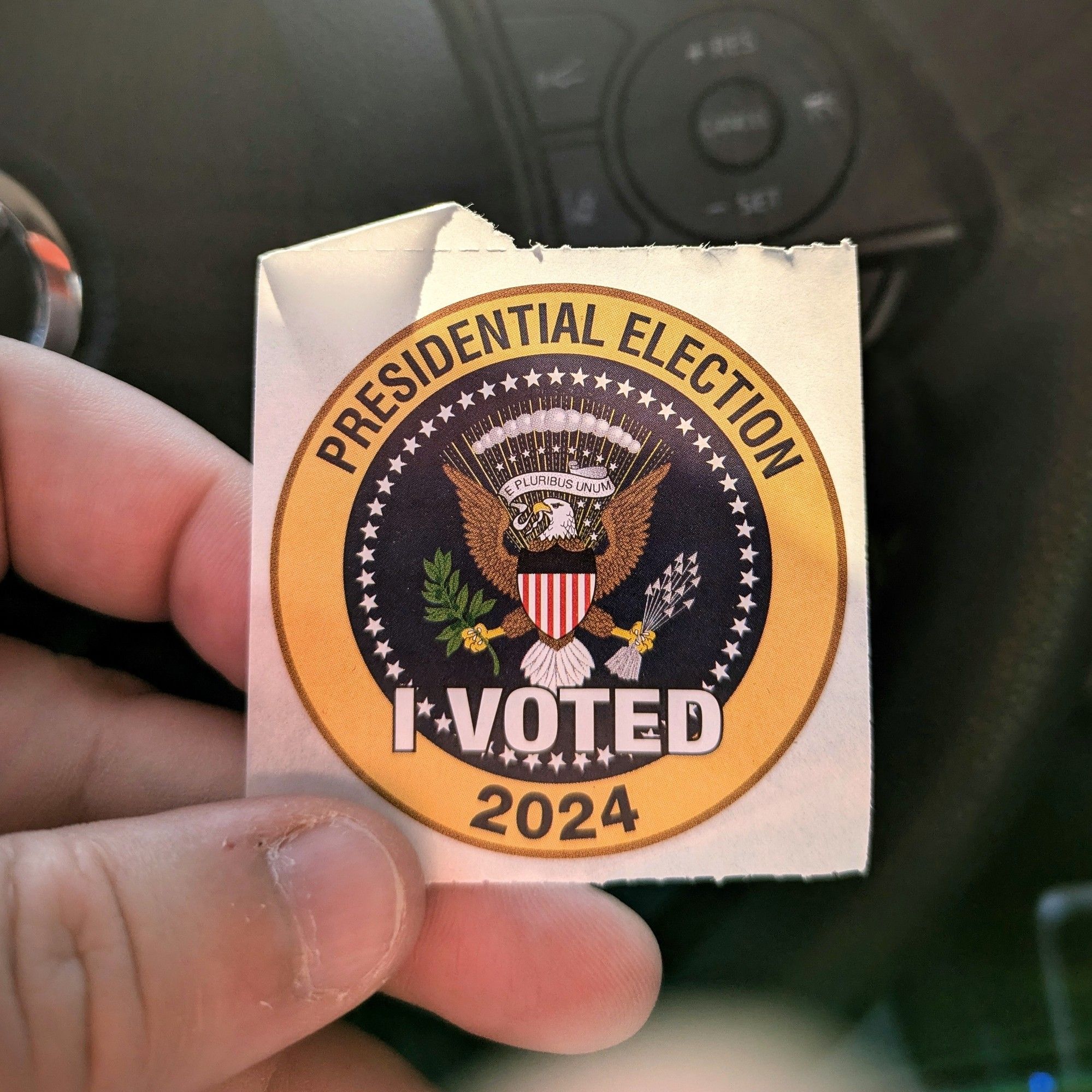 Photo of a Virginia "I voted" sticker that has the presidential seal and says Presidential Election 2024.