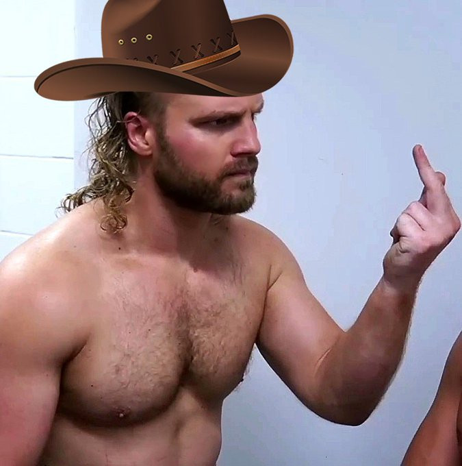 Hangman Adam Page shirtless and flipping off someone off camera, with a cartoon cowboy hat photoshopped onto his head. 