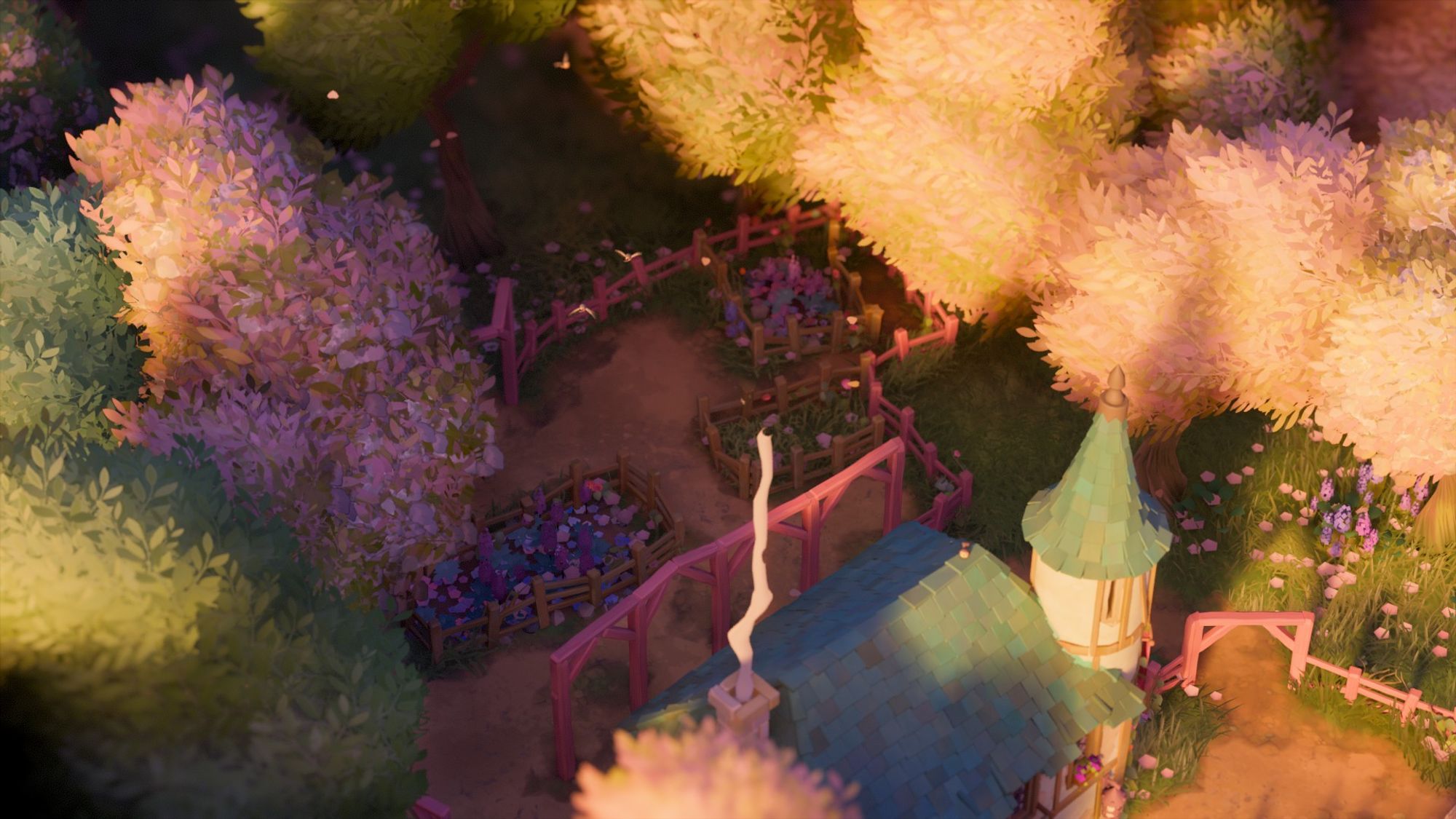 Tiny Glade screenshot showing a tiny Tudor-style house with wooden panel trim and a tiny tower. Behind the house, shot from above, shows pink fencing with trellises and little fenced in garden plots for all sorts of colorful flowers and herbs.