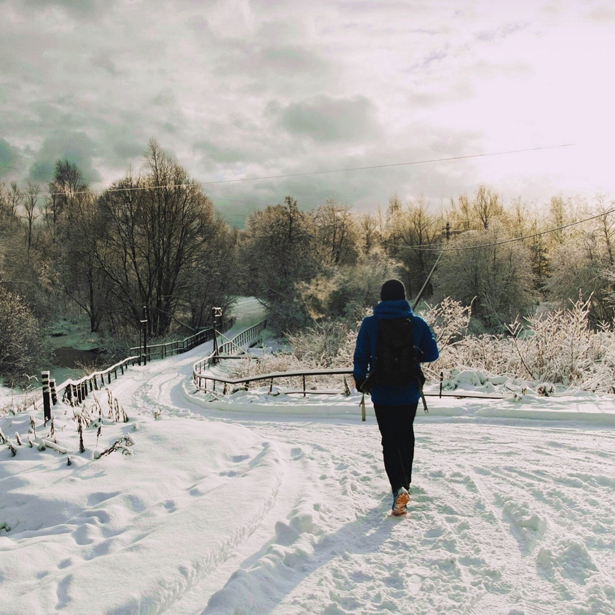 Woman walking in the snow