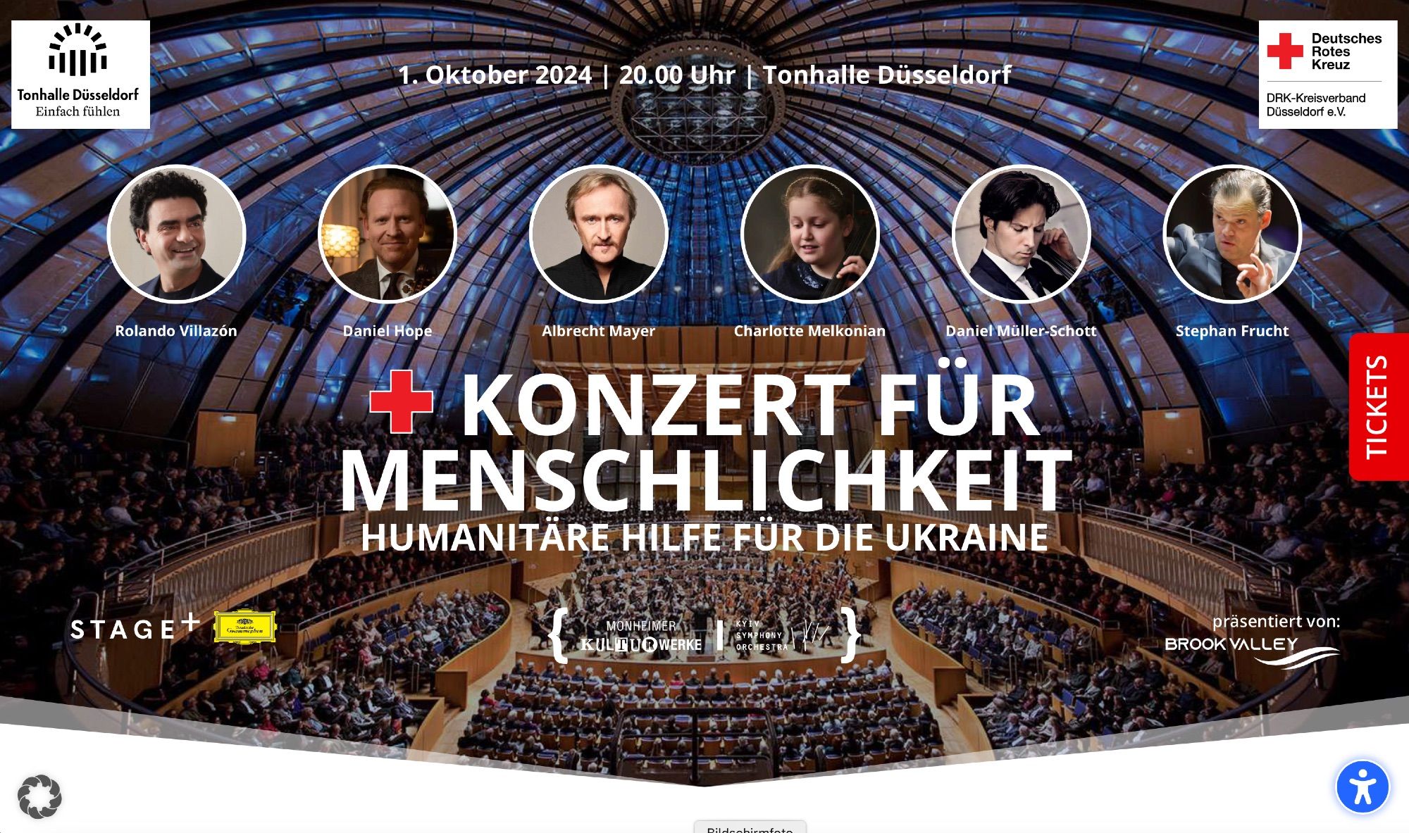 Titelseite der Homepage "konzertfuermenschlichkeit.de" zum gleichnamigen Konzert am 1. Oktober 2024 in der Tonhalle Düsseldorf. Im Hintergrund eine Aufnahme der ausverkauften Tonhalle, im oberen Drittel, über dem Titel "KONZERT FÜR MENSCHLICHKEIT" kleine, runde Porträtfotos der Solist*innen Rolando Villazón, Daniel Hope, Albrecht Mayer, Charlotte Melkonian, Daniel Müller-Schott sowie des Dirigenten Stephan Frucht.