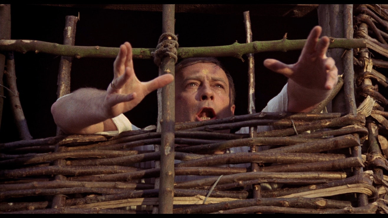 Sgt. Howie from The Wicker Man (1973) put inside the titular wicker man to be burned alive as a sacrifice to replenish the island's crops.