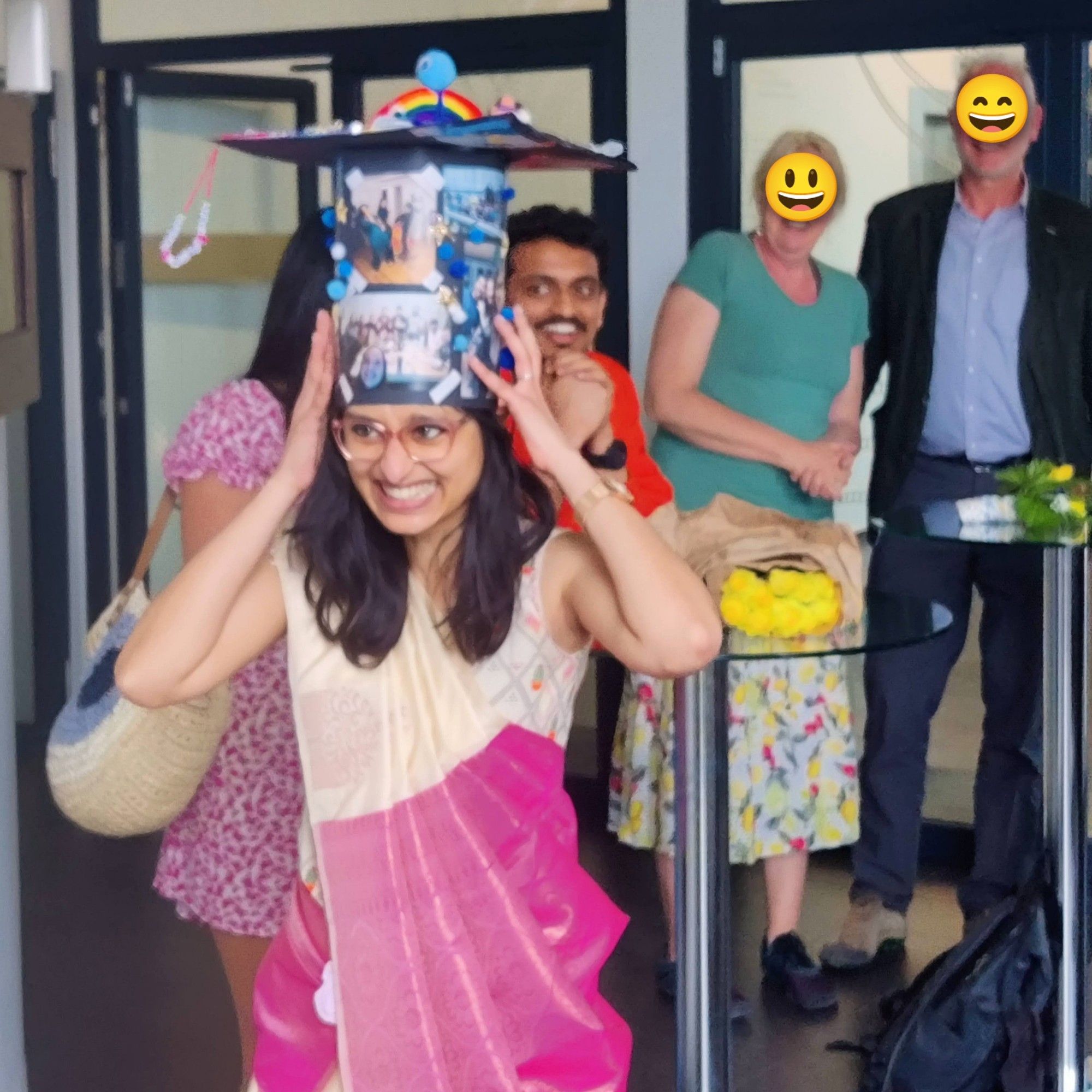 Grinning Lavisha with her PhD hat