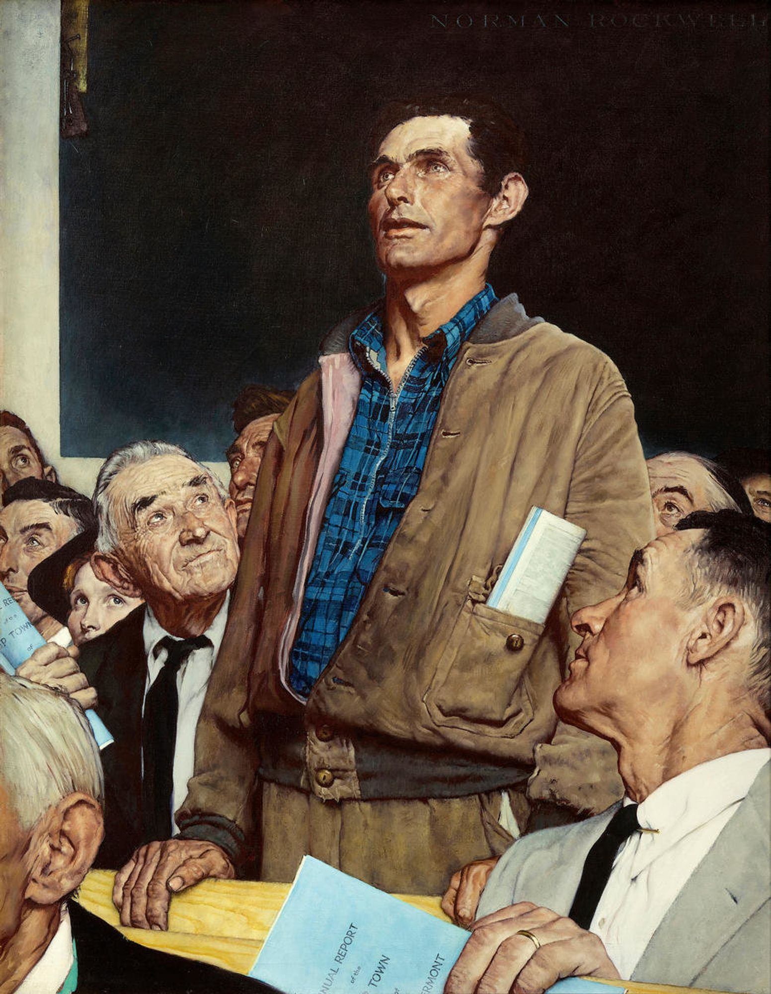 Norma Rockwell's painting "Freedom of Speech" - a man in a brown coat and blue flannel shirt appears to be standing up in the middle of a community meeting of some description. Two of the other attendants are looking up at him expectantly.