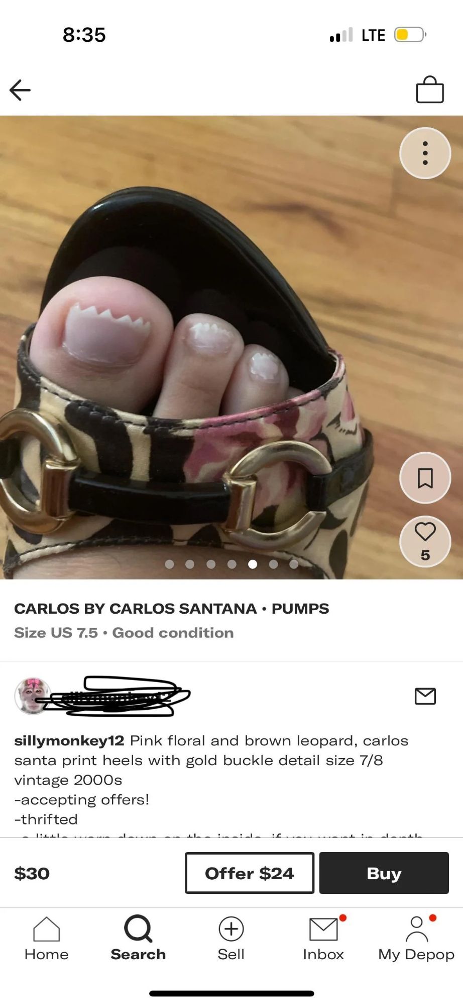 A normal shoe listing but you can see the lady's foot and her toenails are trimmed in the shape of shark teeth for some insane reason