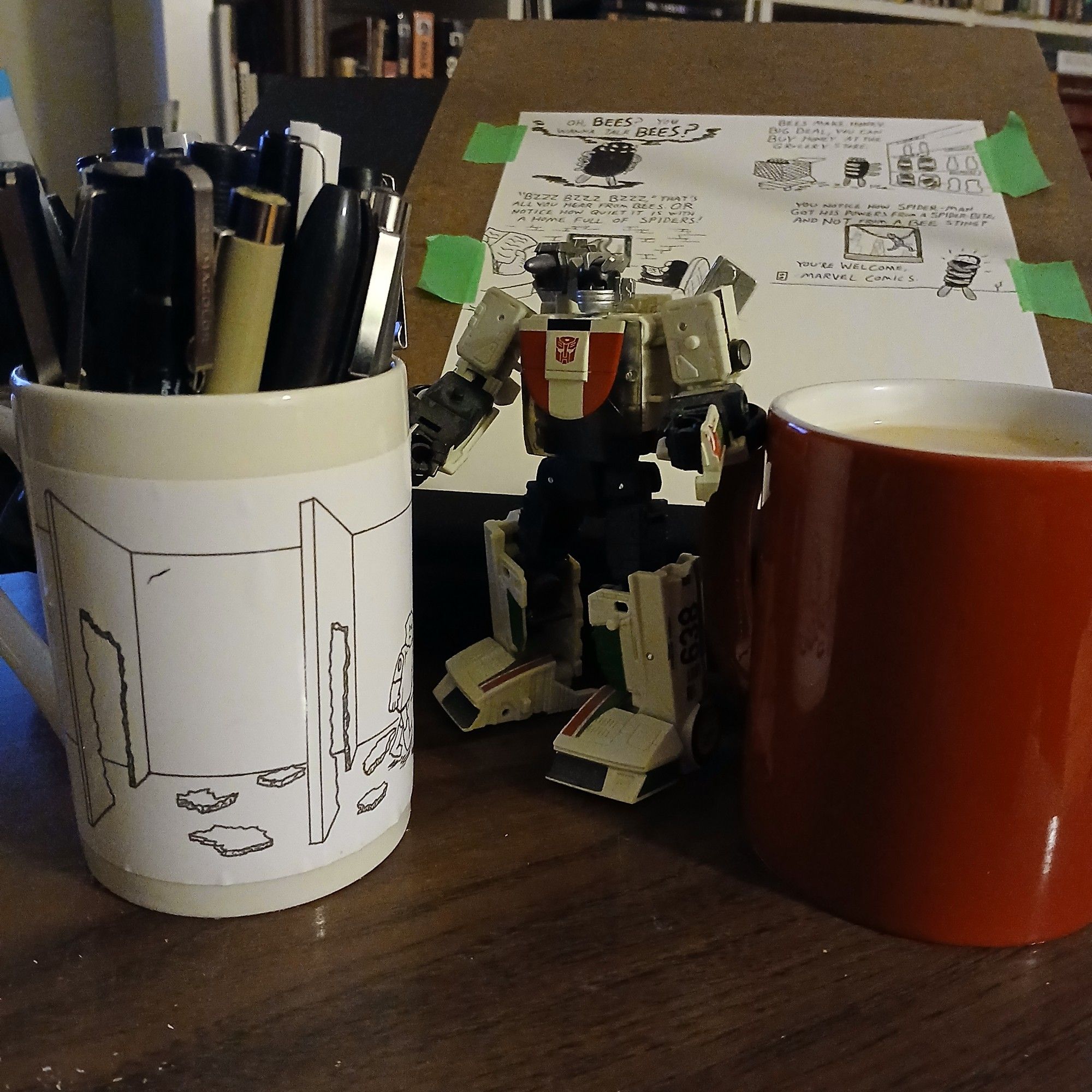 Wheeljack, coffee, my mug full of pens