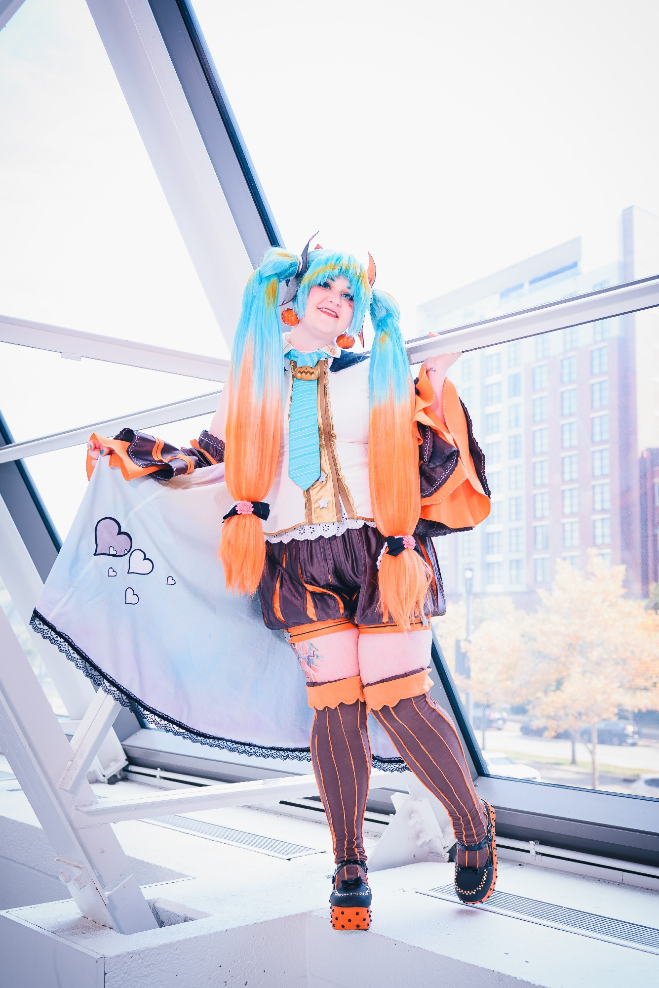 Full body photo of OwlEerie as a Halloween version of Hatsune Miku.