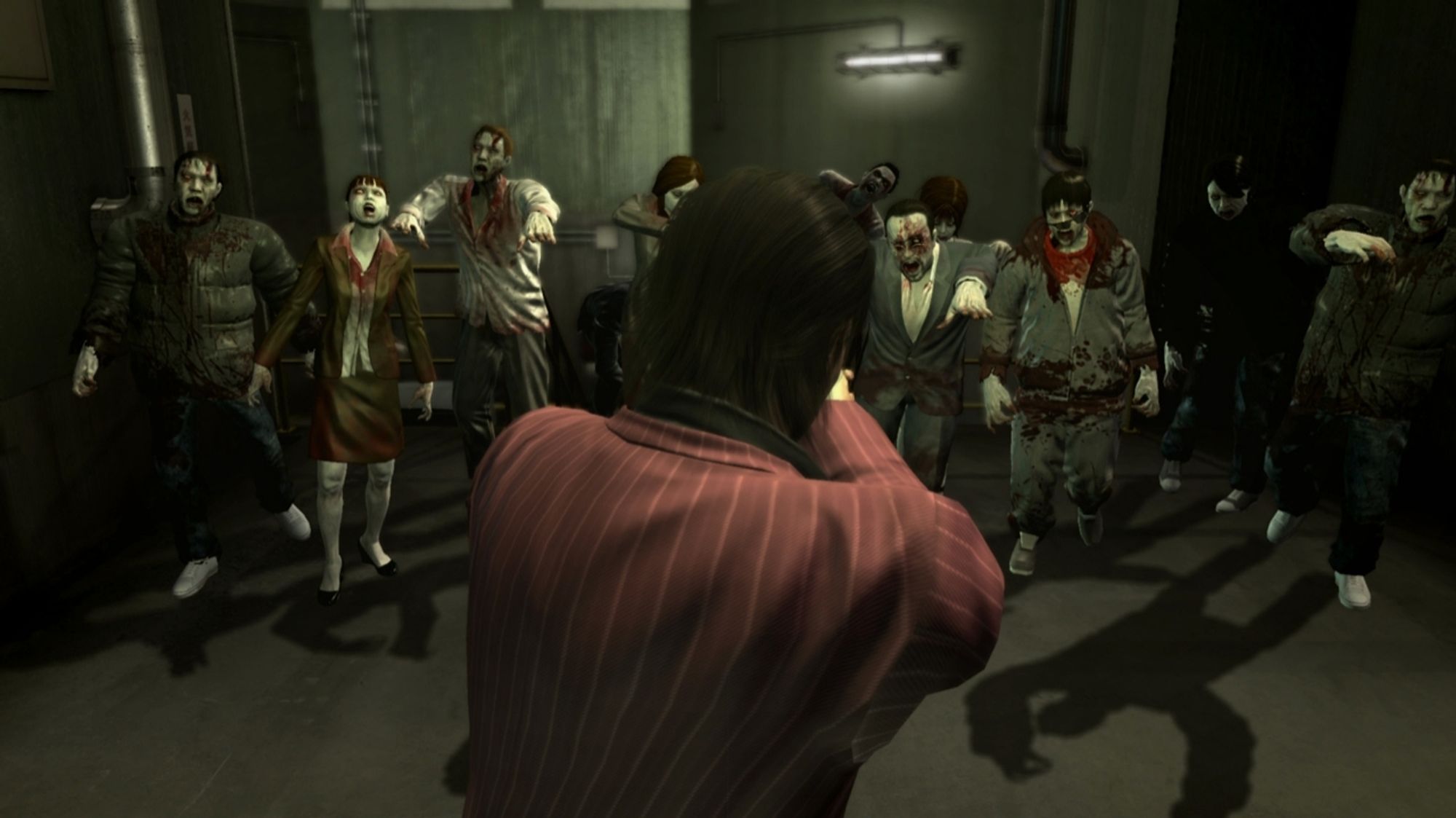 Seen from behind, Akiyama, wearing a red pinstripe suit, faces down a group of zombies indoors.