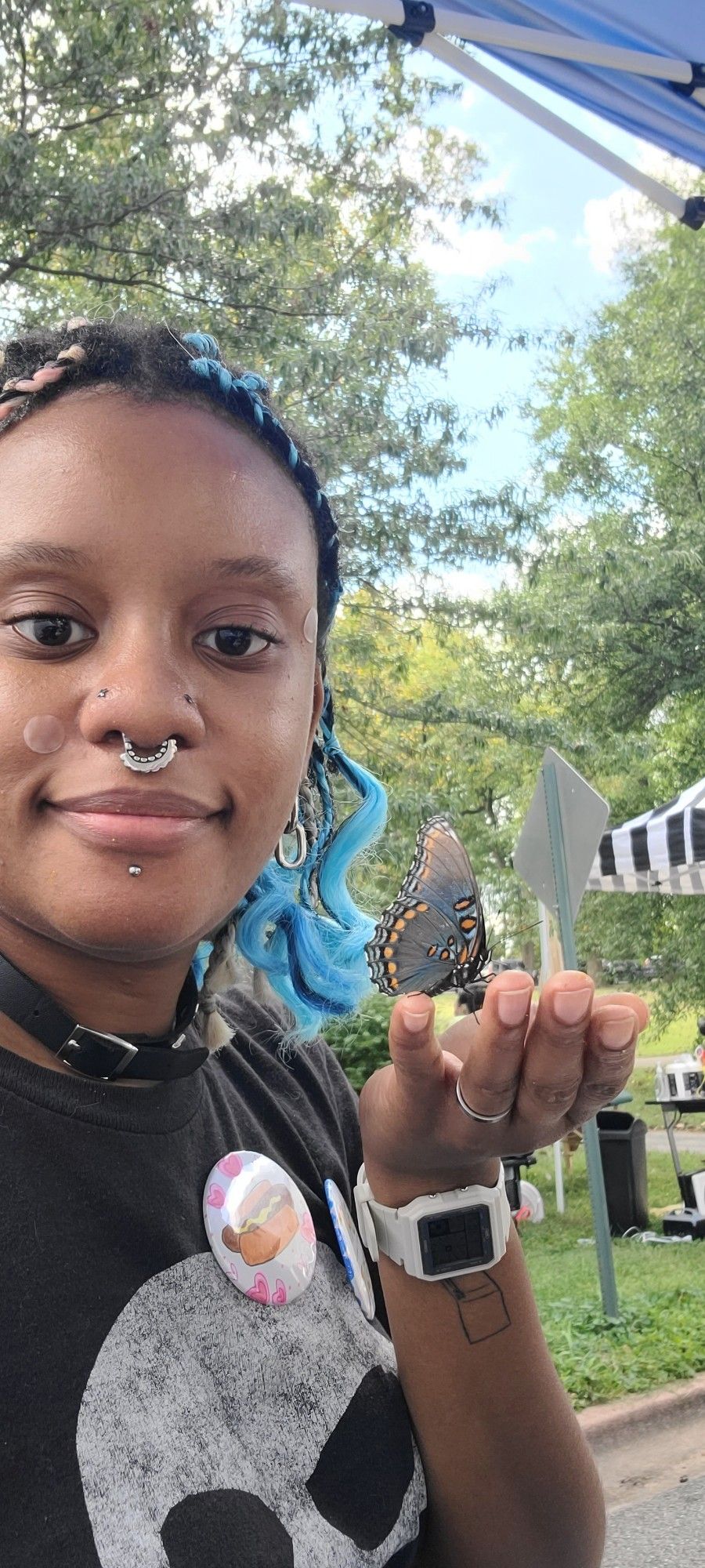 Steenz holding a butterfly