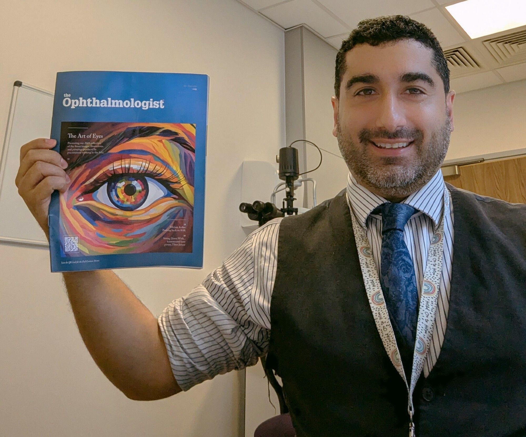 Me holding the cover of the magazine in our eye research centre