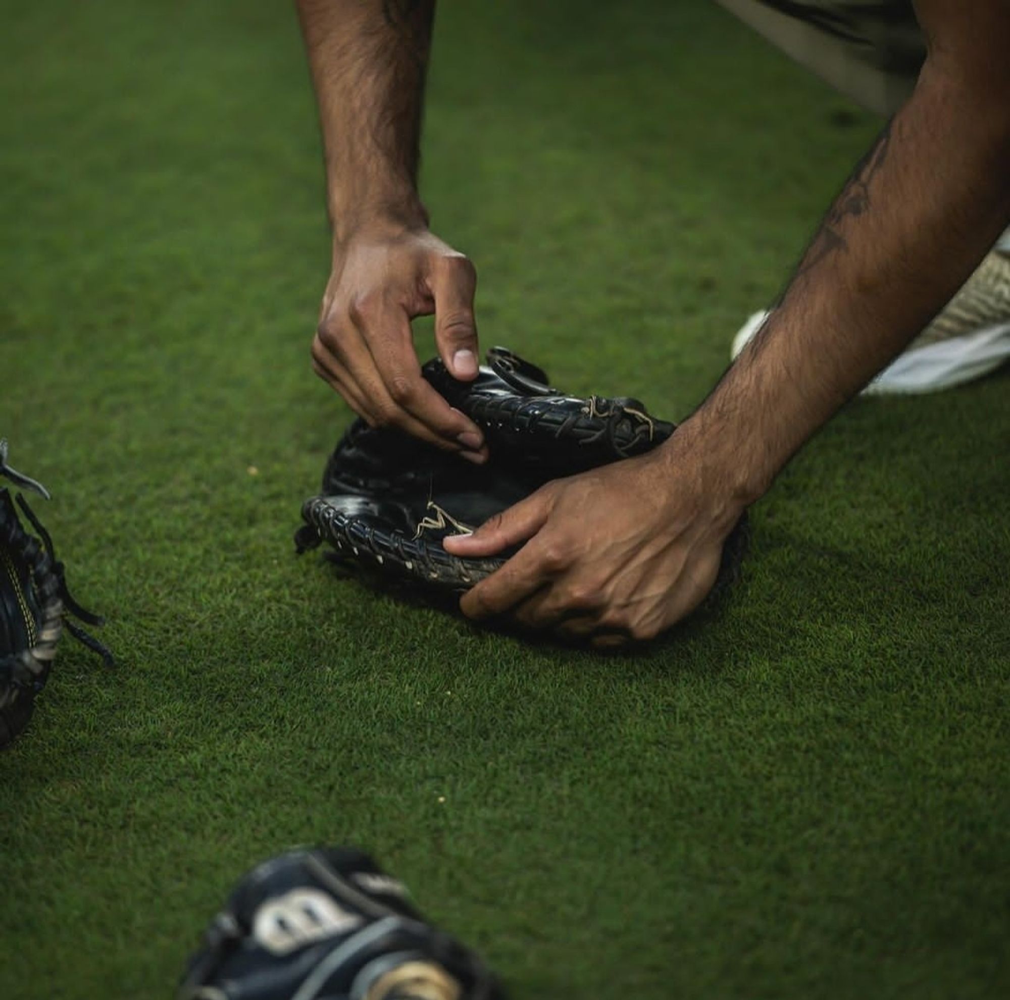 Giving it a tour of his glove