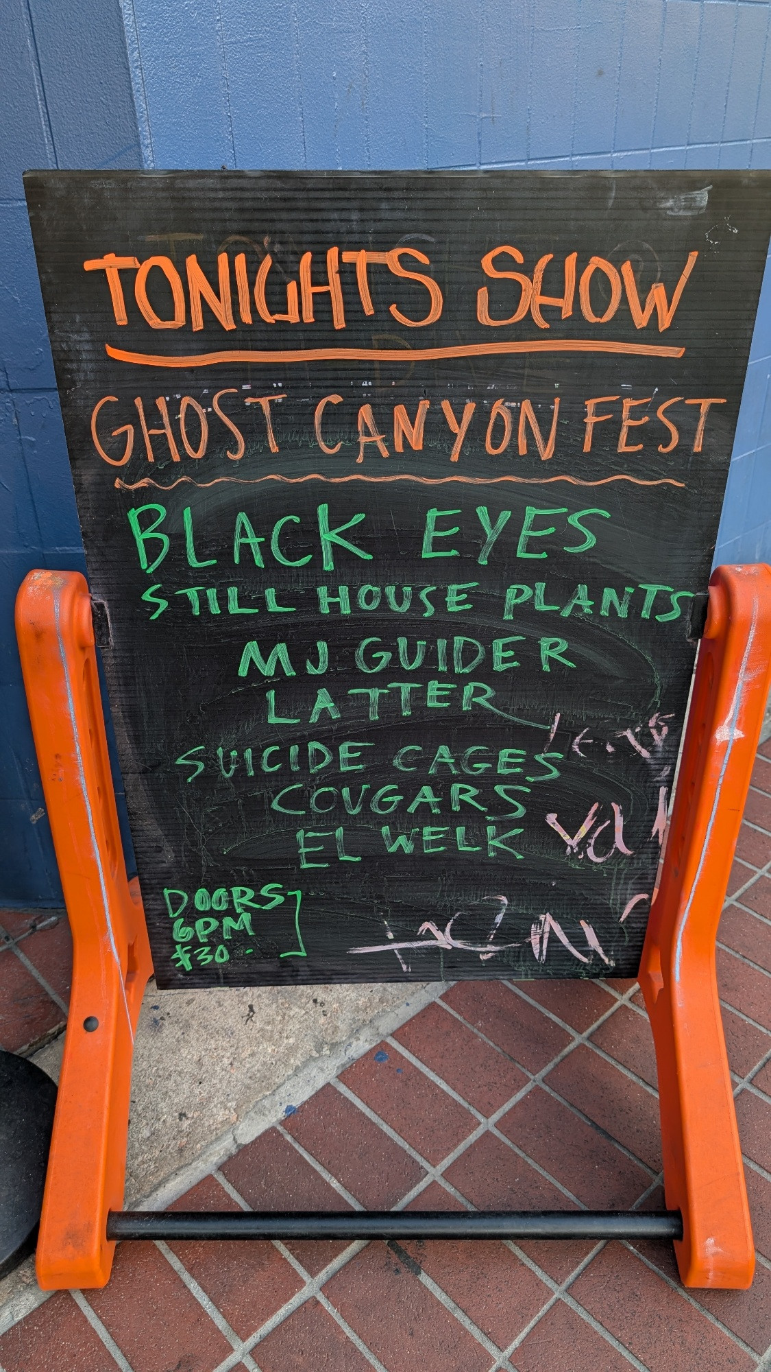 Chalkboard sign outside the Hi-Dive in Denver, CO promoting the Saturday 8/23 edition of Ghost Canyon Fest, featuring Black Eyes, Still House Plants, MJ Guider, Latter and more