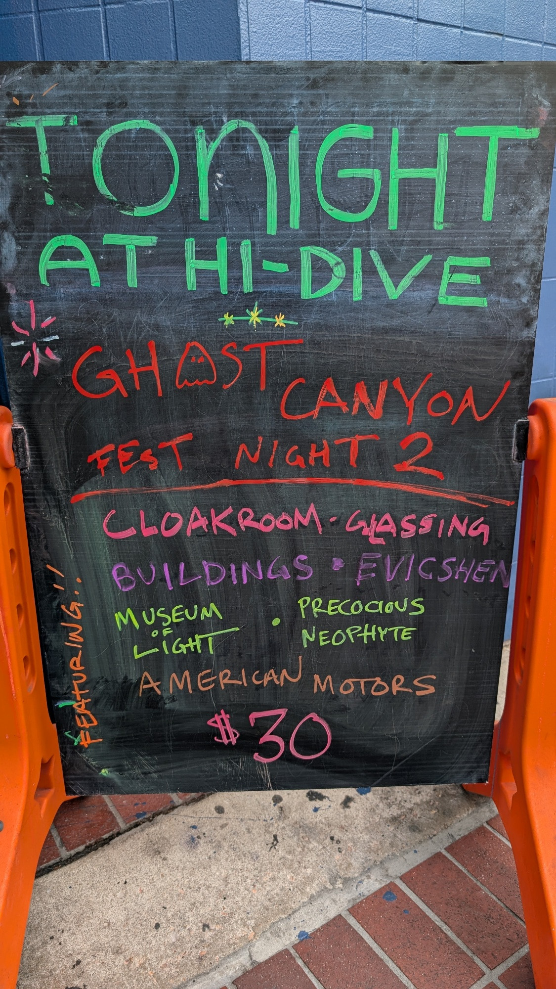 Chalkboard sign outside the Hi-Dive in Denver, CO promoting the Sunday 8/24 edition of Ghost Canyon Fest, featuring Cloakroom, Glassing, Buildings, Evicshen and more