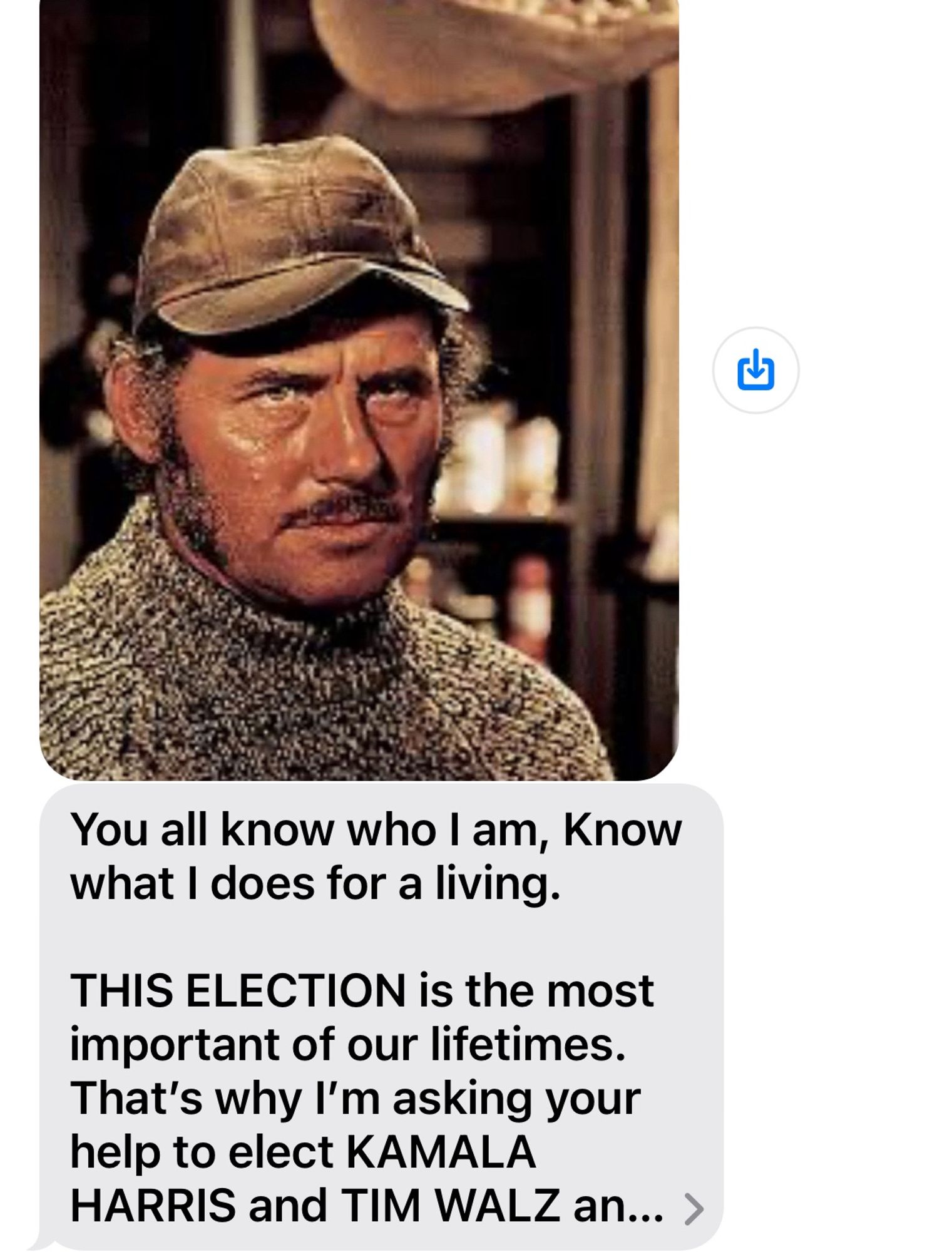 A screenshot of a scam text with a still of Quint from Jaws paired with a fundraising plea for the Harris/Walz campaign.