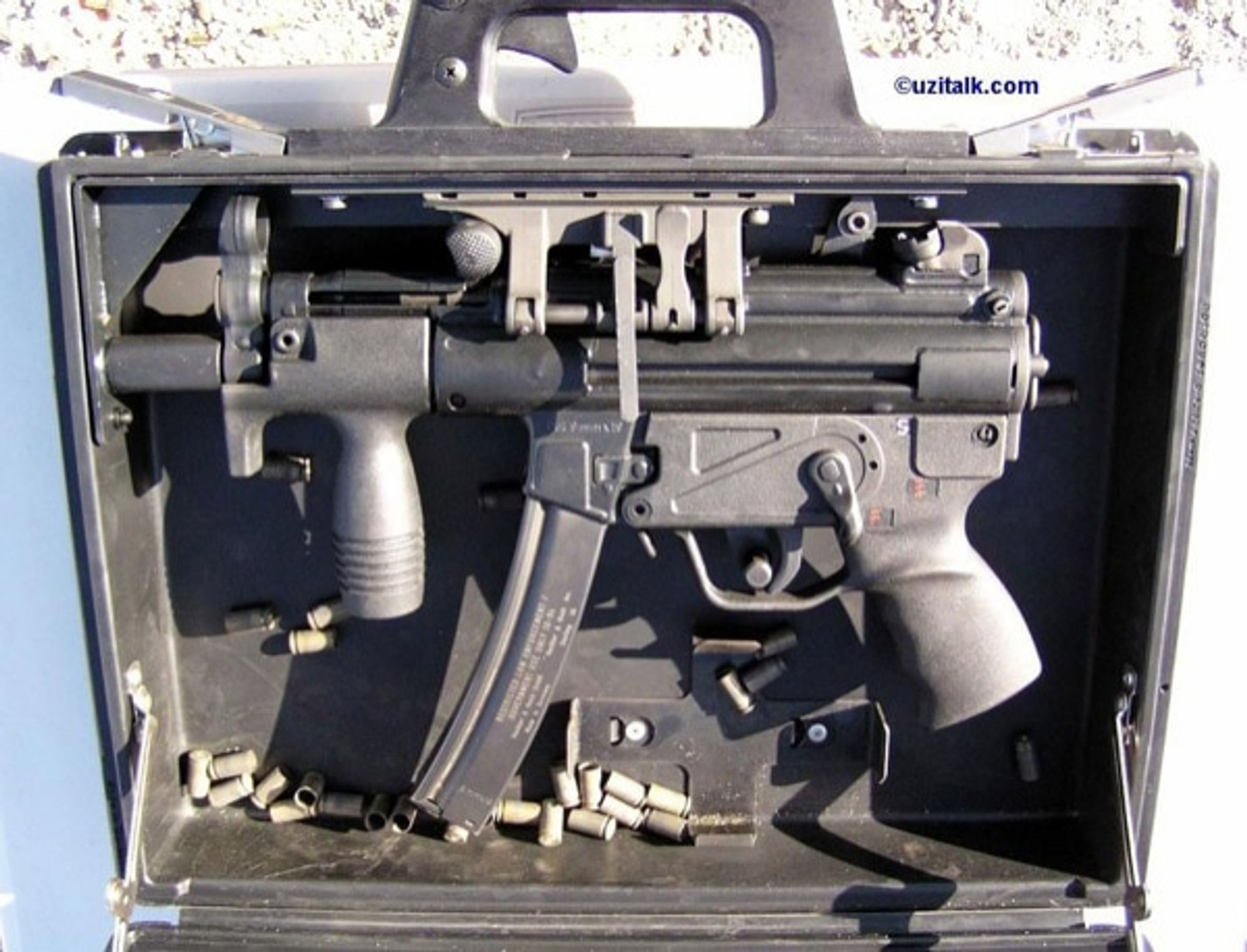 mp5 mounted in briefcase