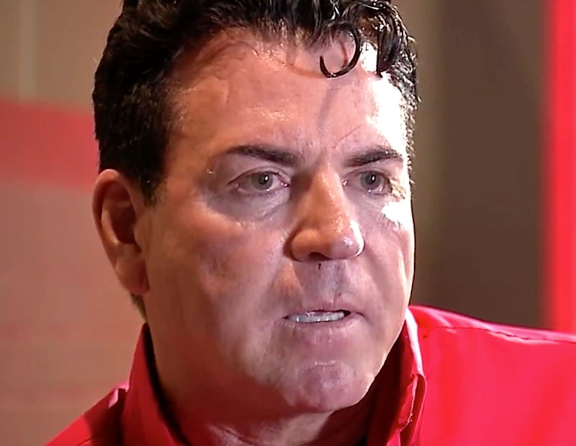 Papa John, sopping wet, his eyes fixed on something in the distance (lawn deer)