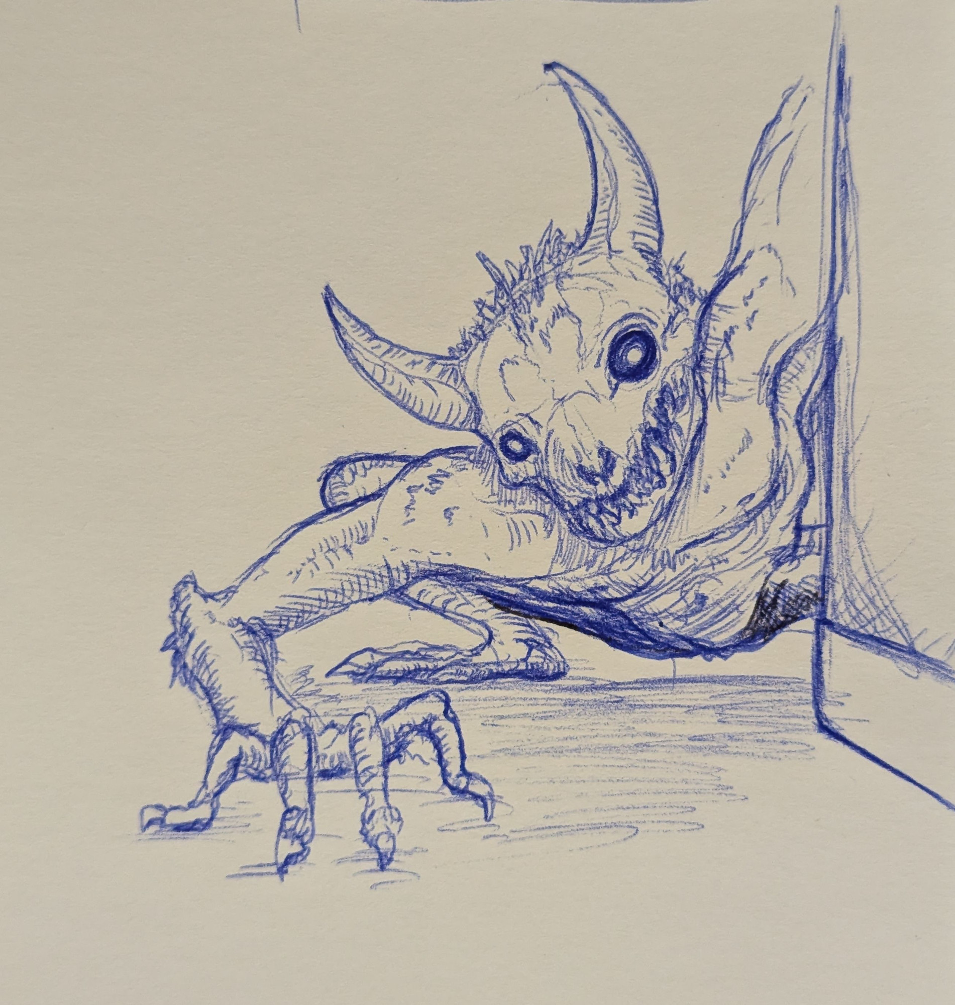 A blue pen sketch of a spooky skull creature looking at you 😳