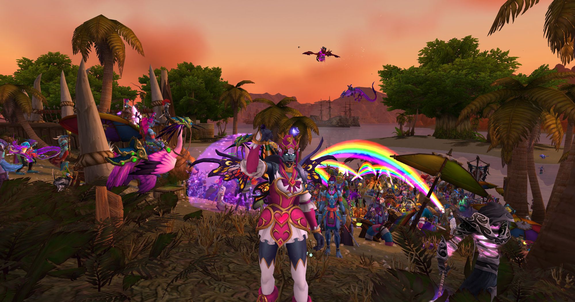 Images 1 and 2: Front and back screenshot of my Zandalari Troll in pink anime girl transmog with the Troll Run 2024 gathering in the background, which includes many types of Trolls, rainbows, colorful chairs, etc!