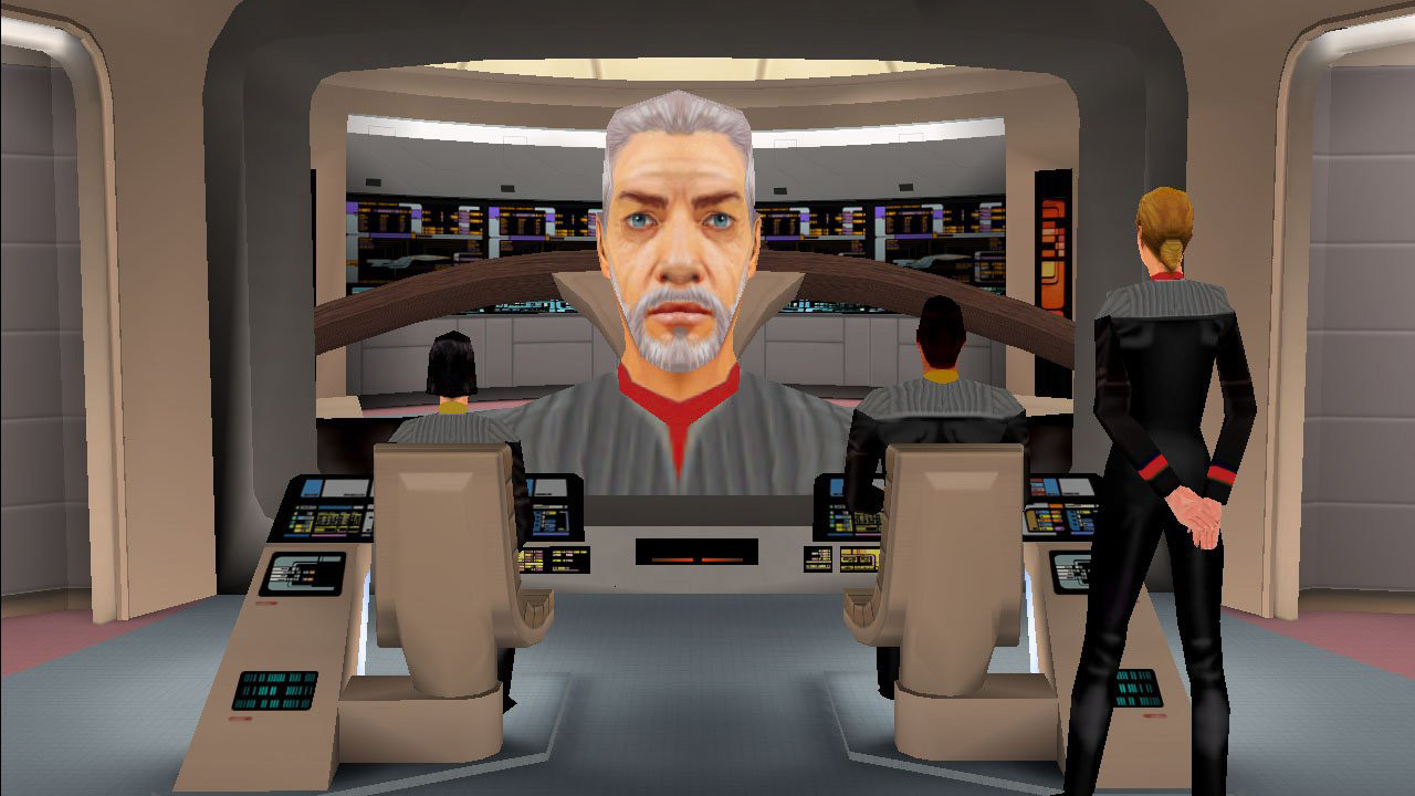 In-game screen capture from Star Trek: Bridge Commander. POV from the captain's chair on the bridge of the Galaxy class starship USS Dauntless. For some reason Paul Hollywood seems to be on the viewscreen. Maybe the Romulans have kidnapped Mary Berry?