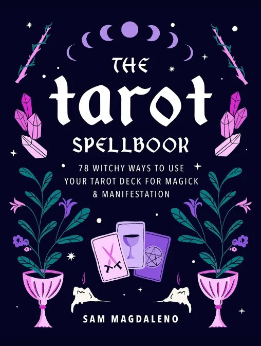 various witch and tarot symbols on the cover, wands, cups, cards, plants, crystals, moon phases