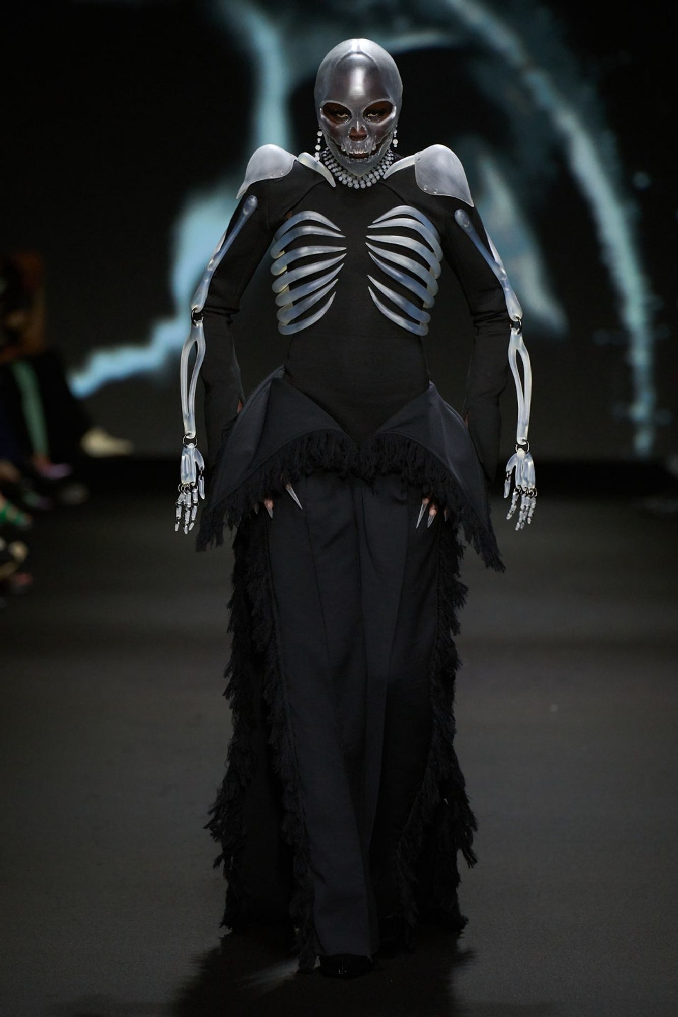 a black dress with translucent looking bones