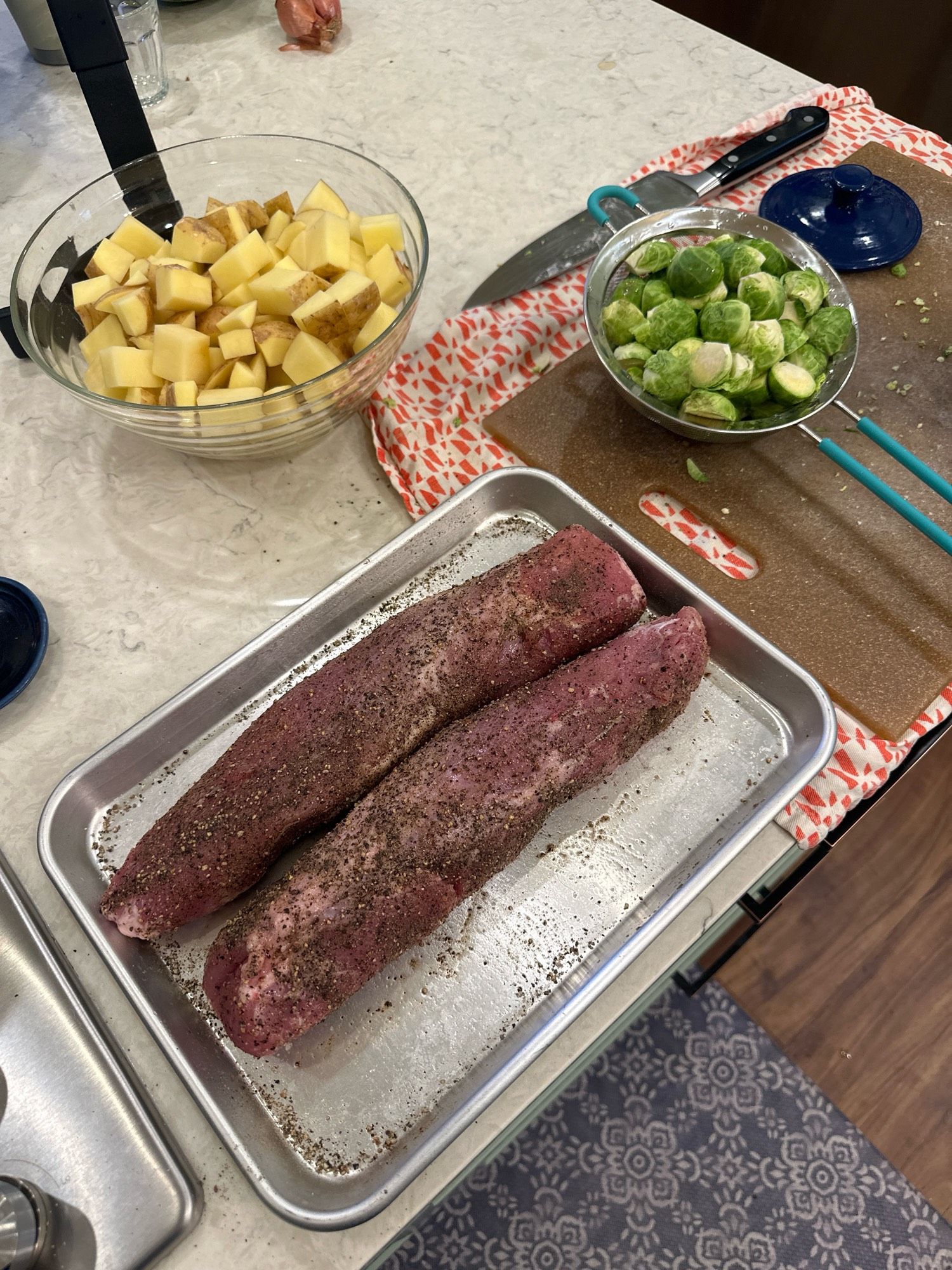 Pre cook: two pepper crusted tenderloins. Forgot to get pics..hands busy shoveling food into mouf