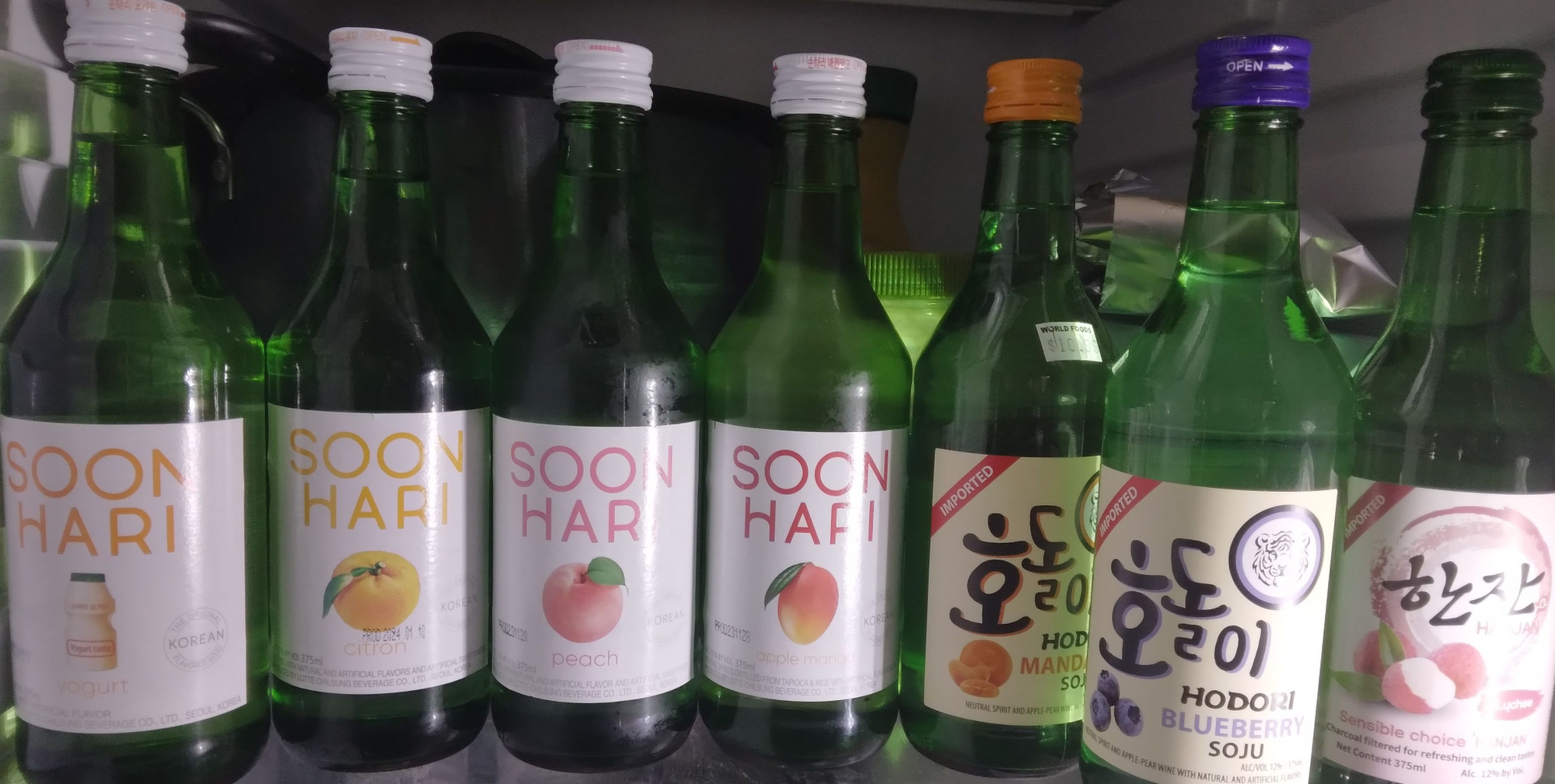 Different flavored soju such as grape, mango, yogurt, blueberry, lemon and more