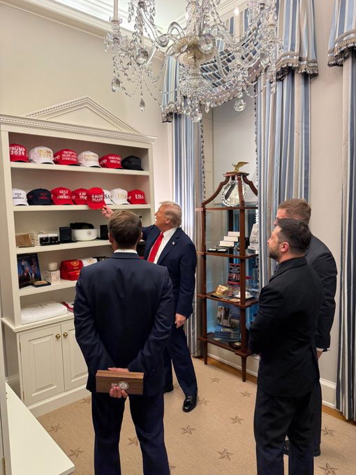 Trump shoeing off his White House hat display at the gift shop