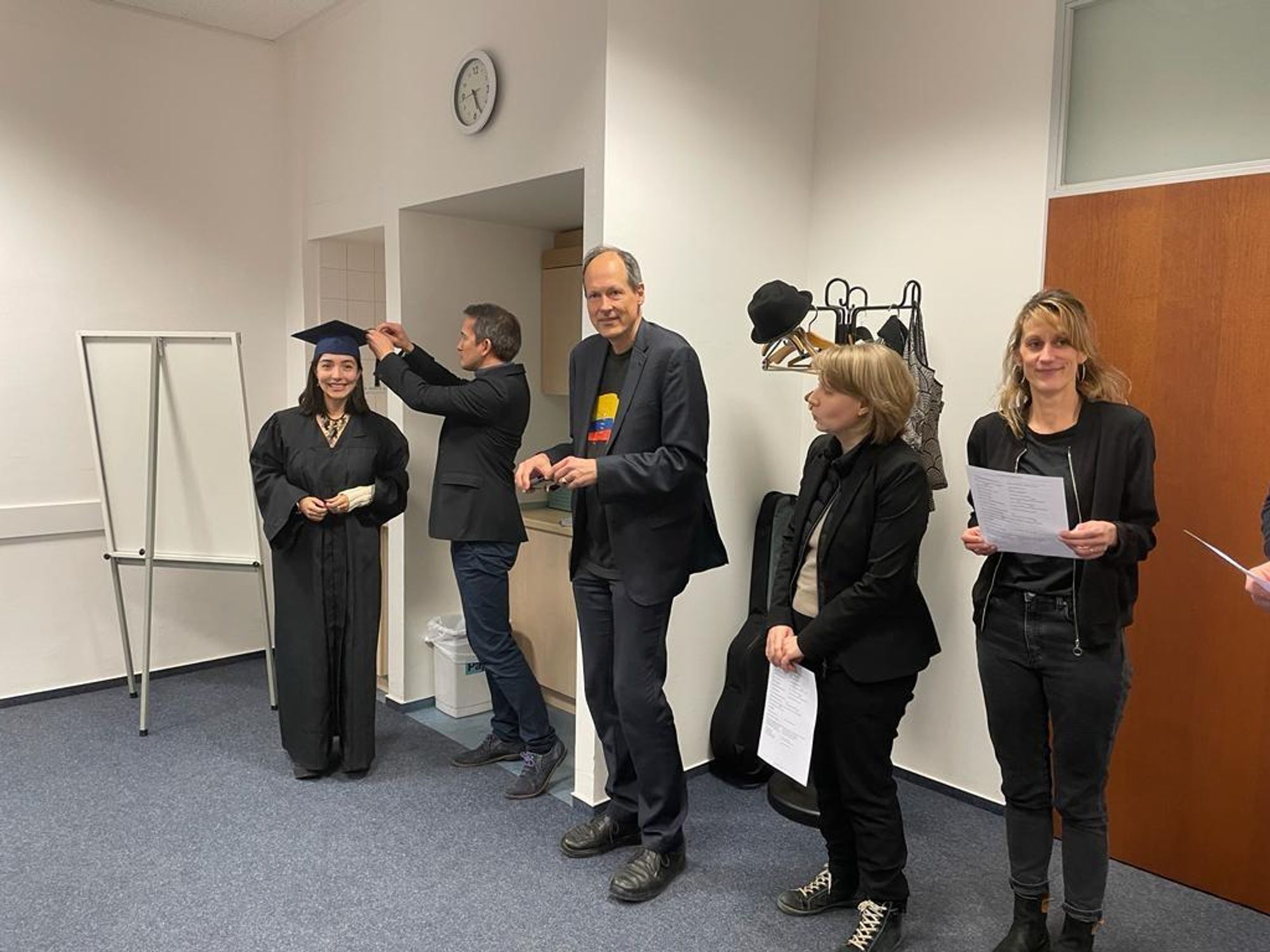 Paola receiving the Phd-hat