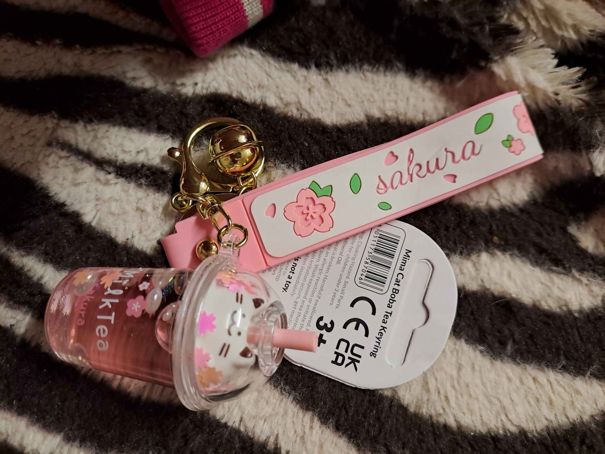 a closer view of the sakura bubble milk tea keychain