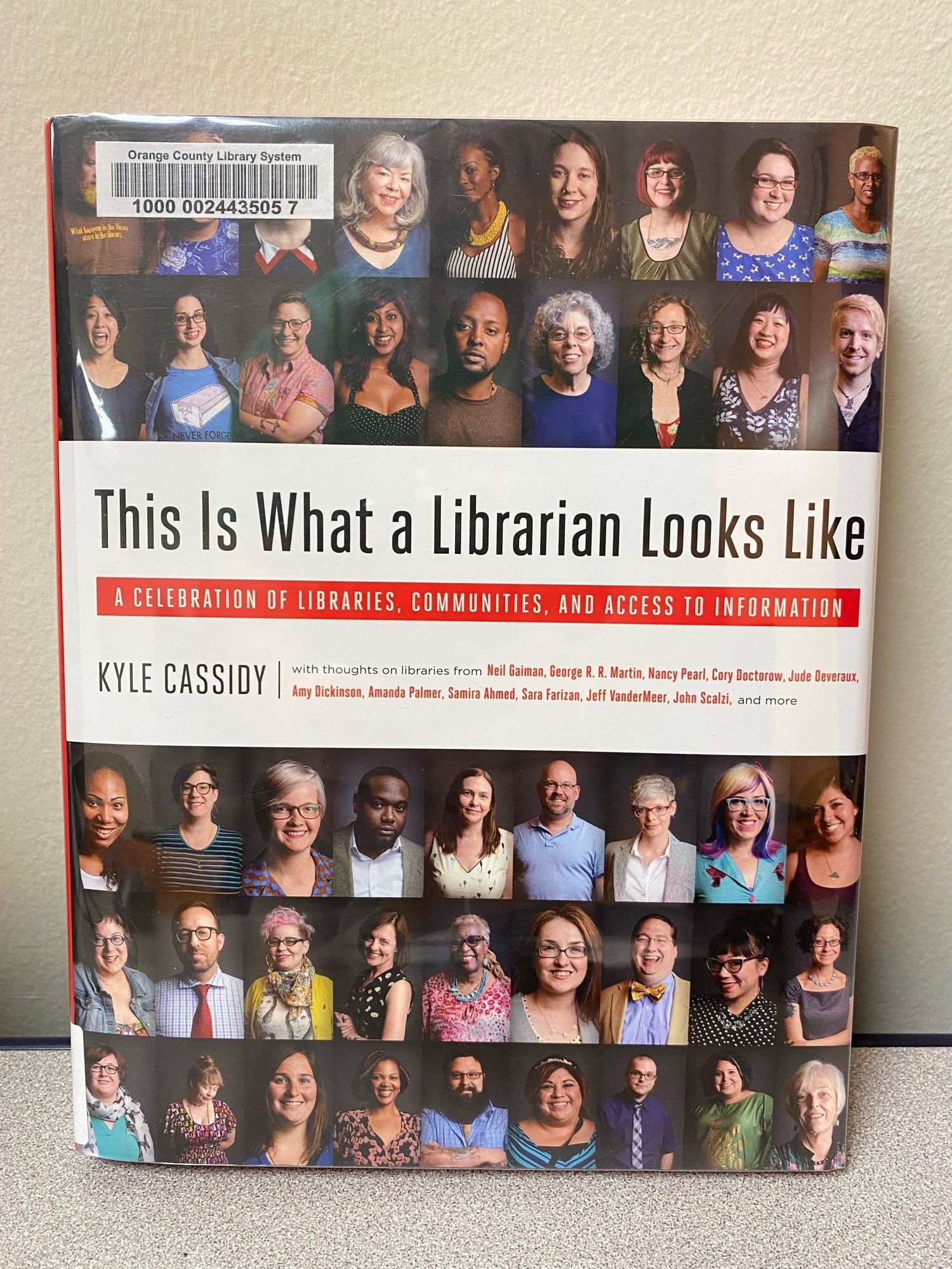 A photo of the cover of the book “This is What a Librarian Looked Like” by Kyle Cassidy.  The cover features professional photos of a diverse array of librarians