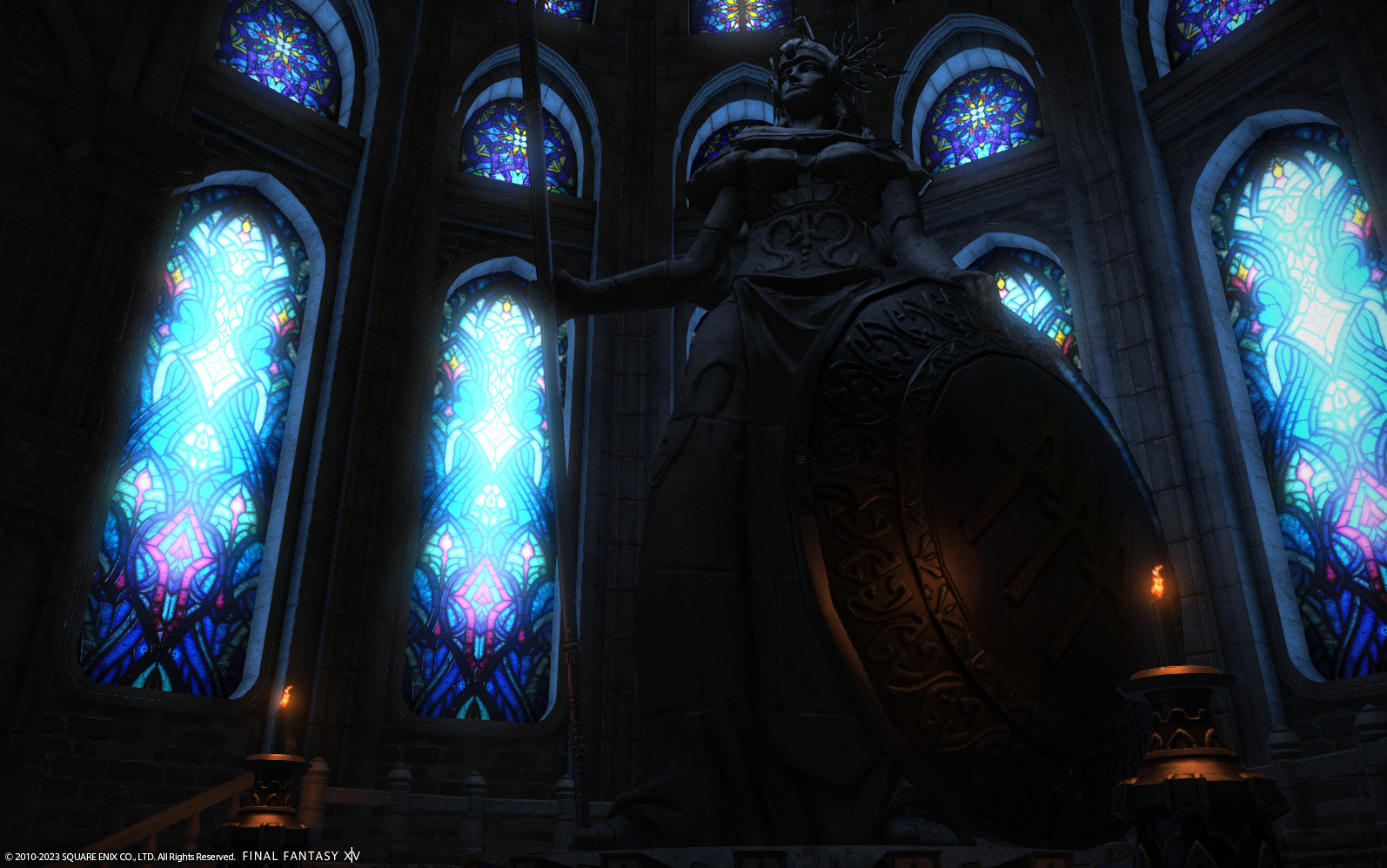 Statue of Halone surrounded by stained glass windows.