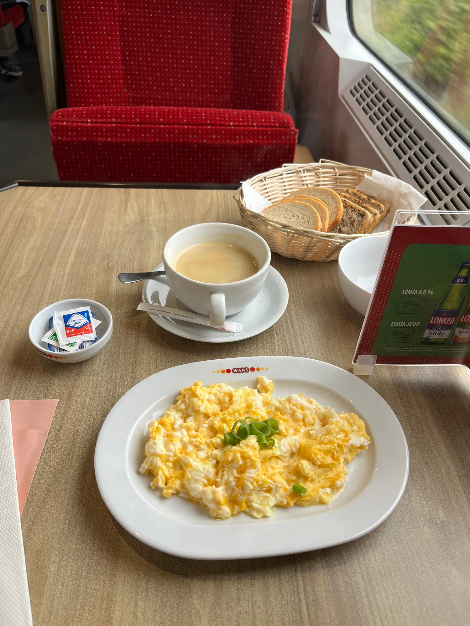 Breakfast on EC41. Scrambled eggs, bread, coffee. 