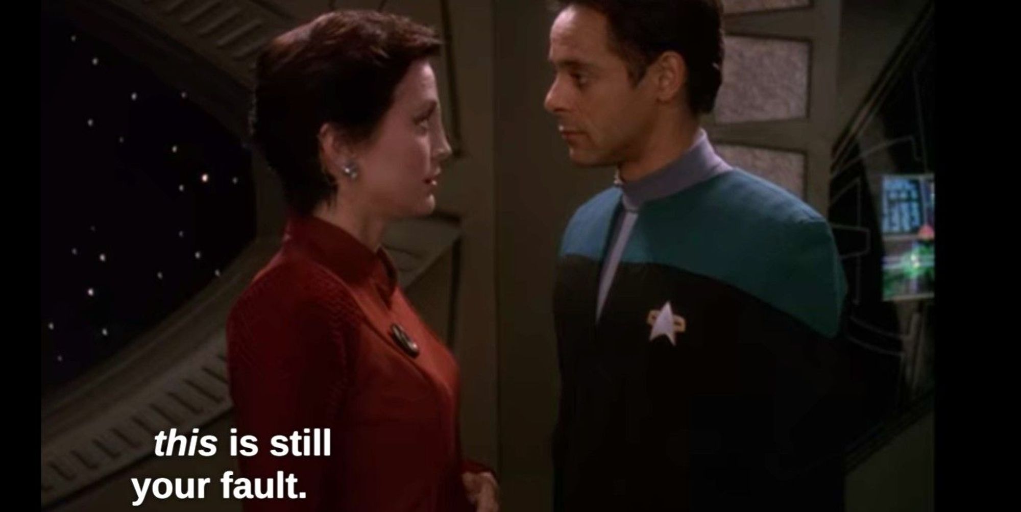 Kira and Bashir from Star Trek: Deep Space Nine episode "Apocalypse Rising". Text: this is still your fault.