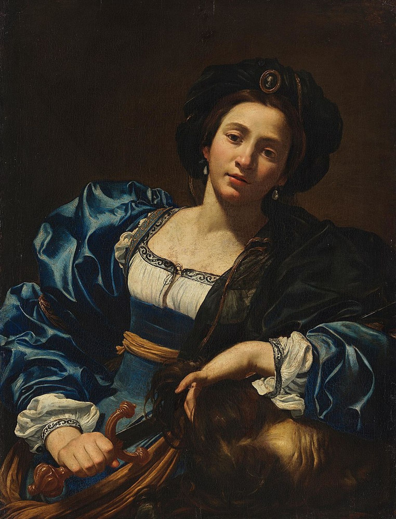 Painting of Judith holding the severed head of king Holofernes