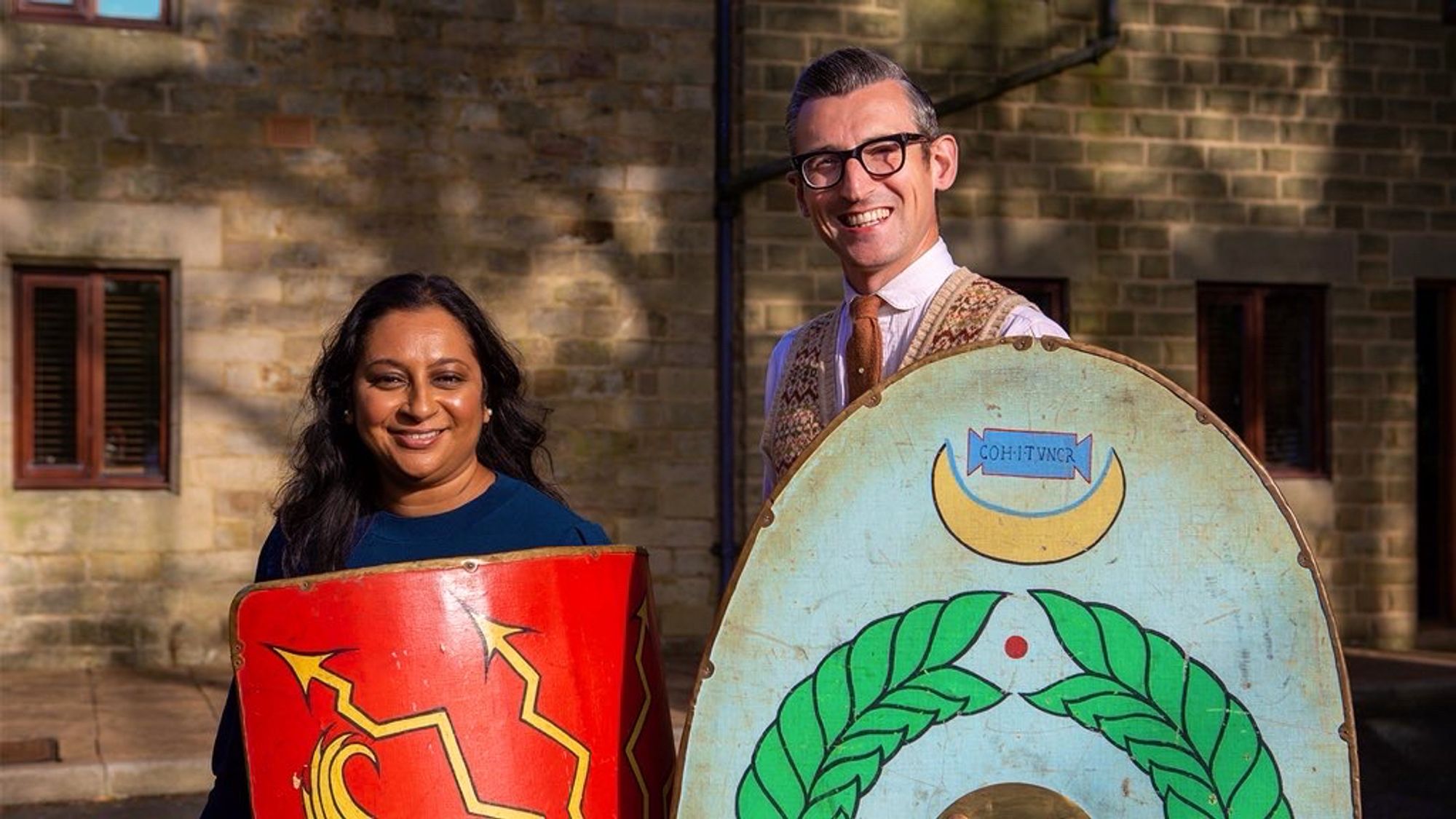 Raksha Dave and Ben Shires goofing around with Roman shields