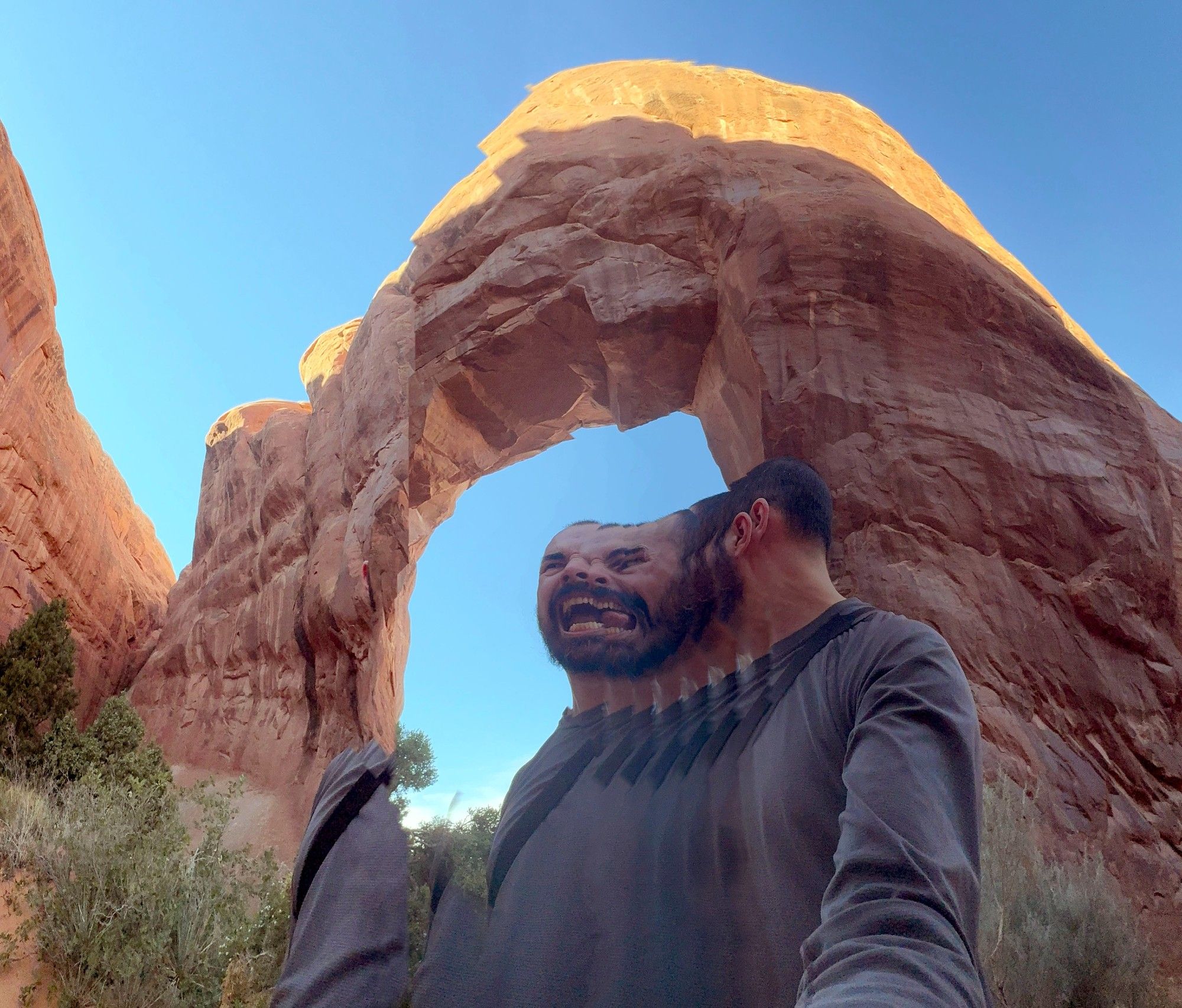 Glitched panorama image at Pine Arch in Arches National Park where I am becoming multitudes.