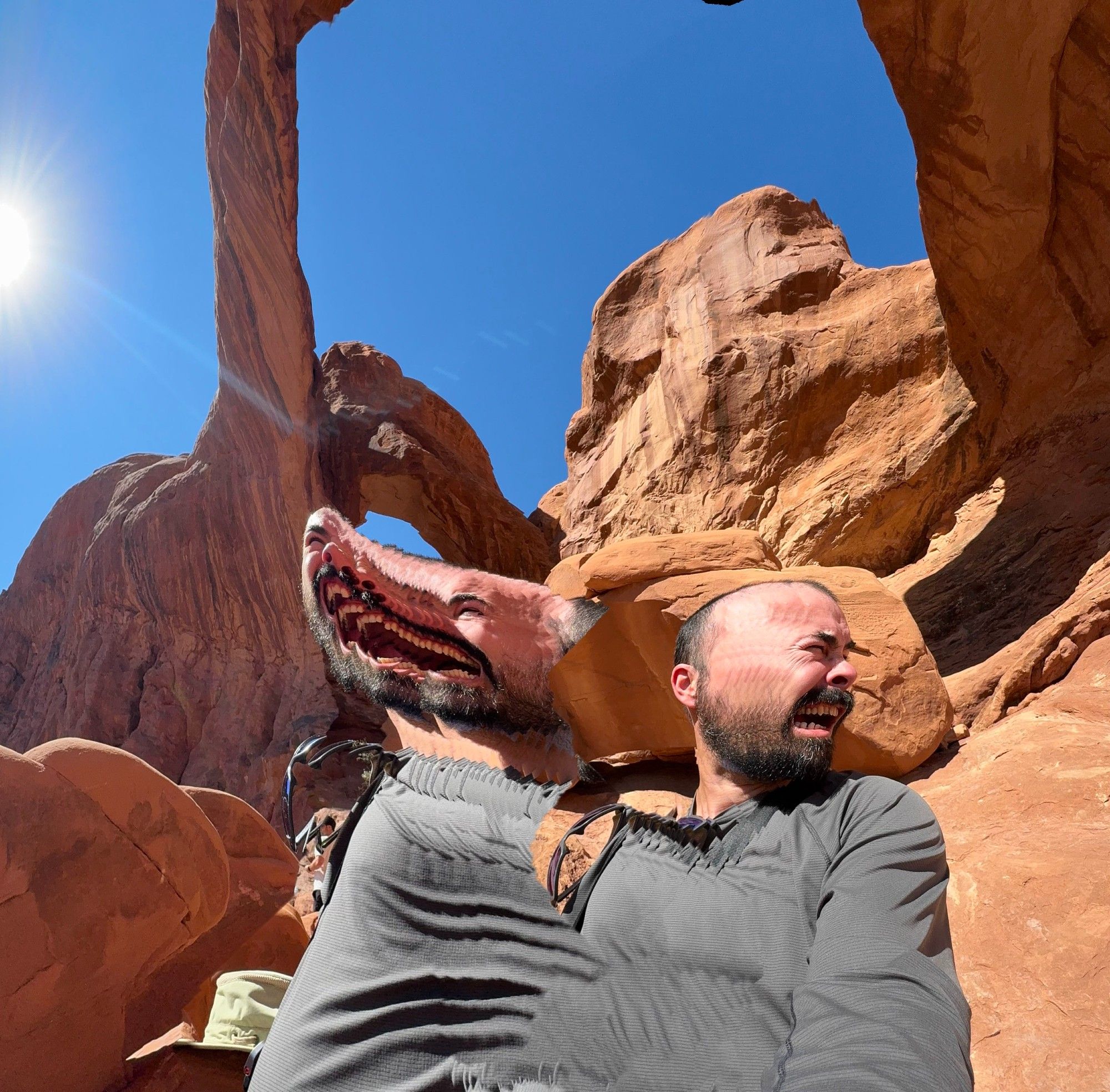 Glitched panorama image at Double Arch in Arches National Park where it looks like the heat of the sun is slapping my face into multiple dimensions.