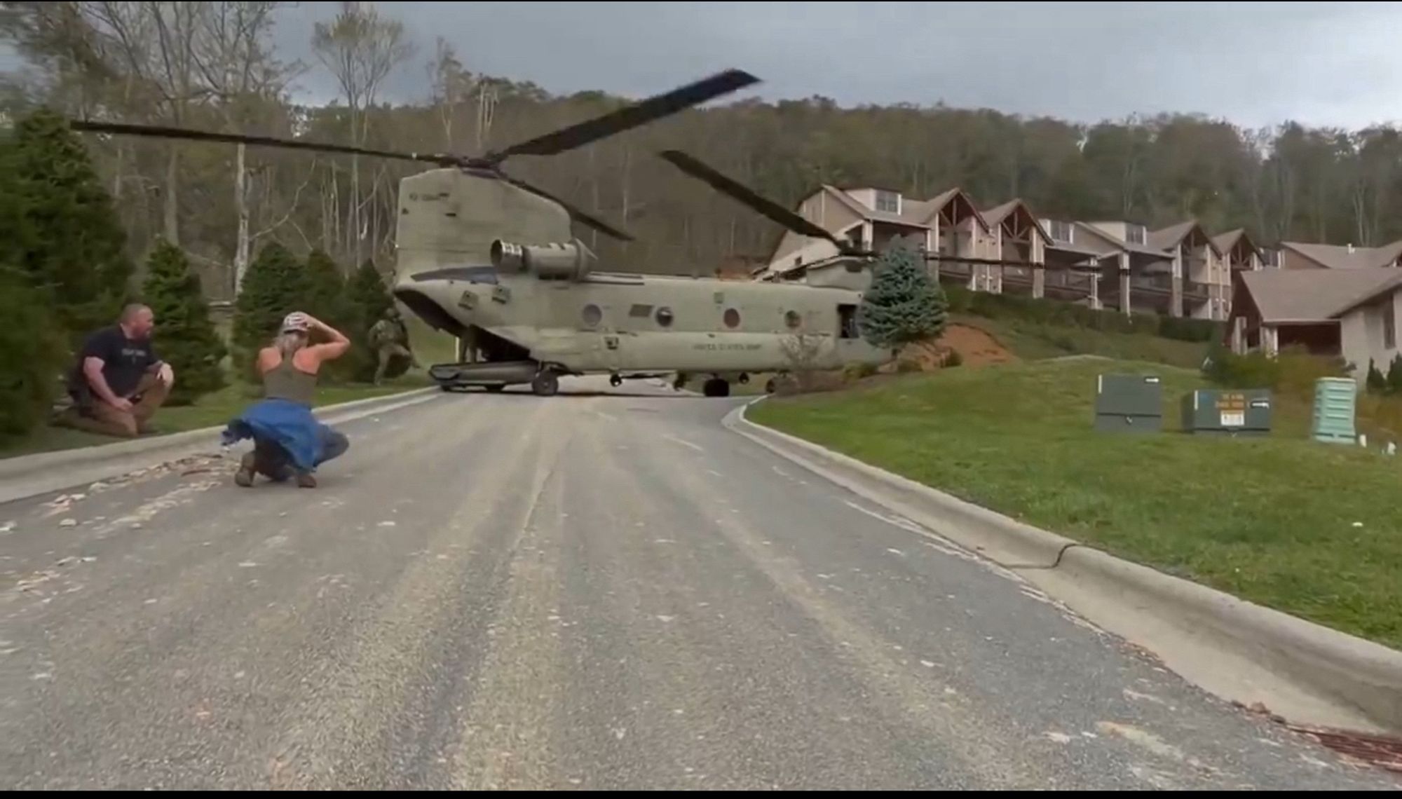 He still image grab from video footage of an American Chinook landing to evacuate people from cut off areas in Appalachia