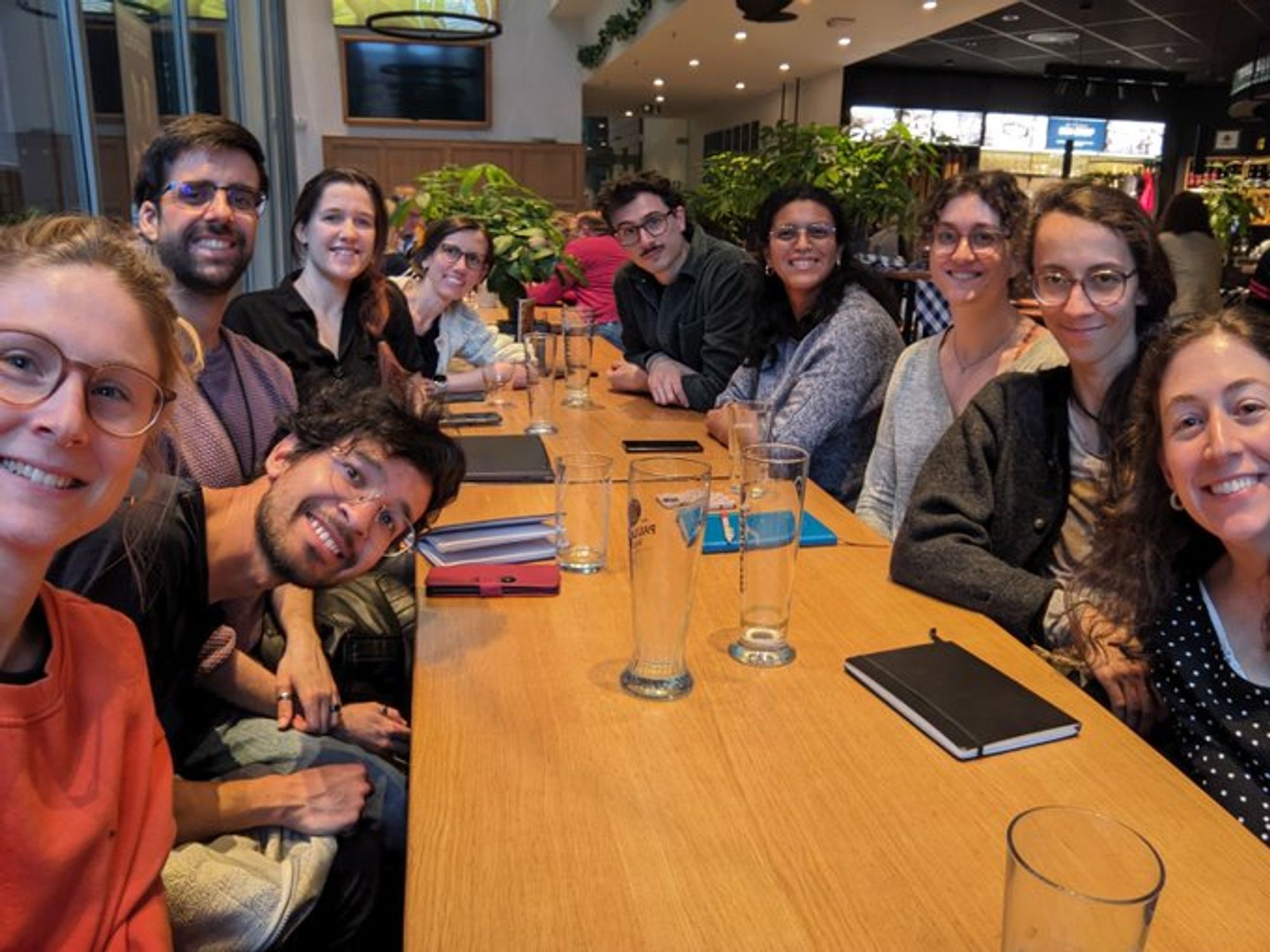 Team of Pint of Science Berlin sitting at a table