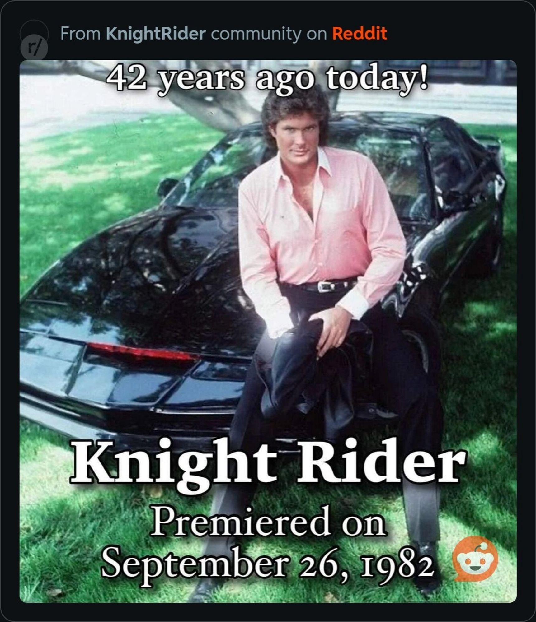 A photo of Michael Knight leaning on the hood of KITT, with the text: "42 years ago today! Knight River Premiered on September 26, 1982"